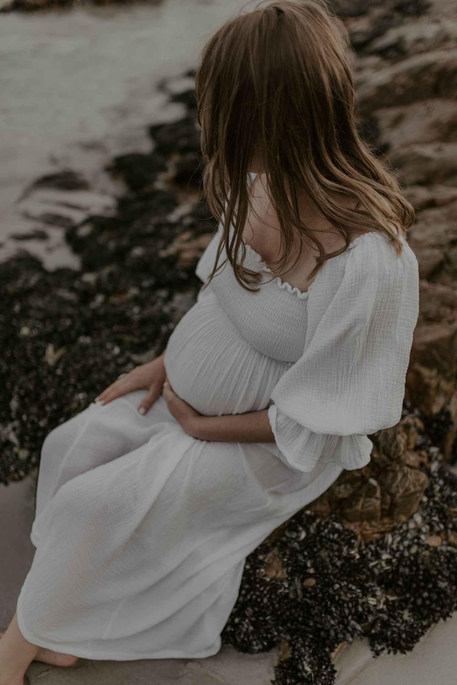 Natural maternity portraits near Cape Town capturing the beauty of motherhood before baby's arrival.