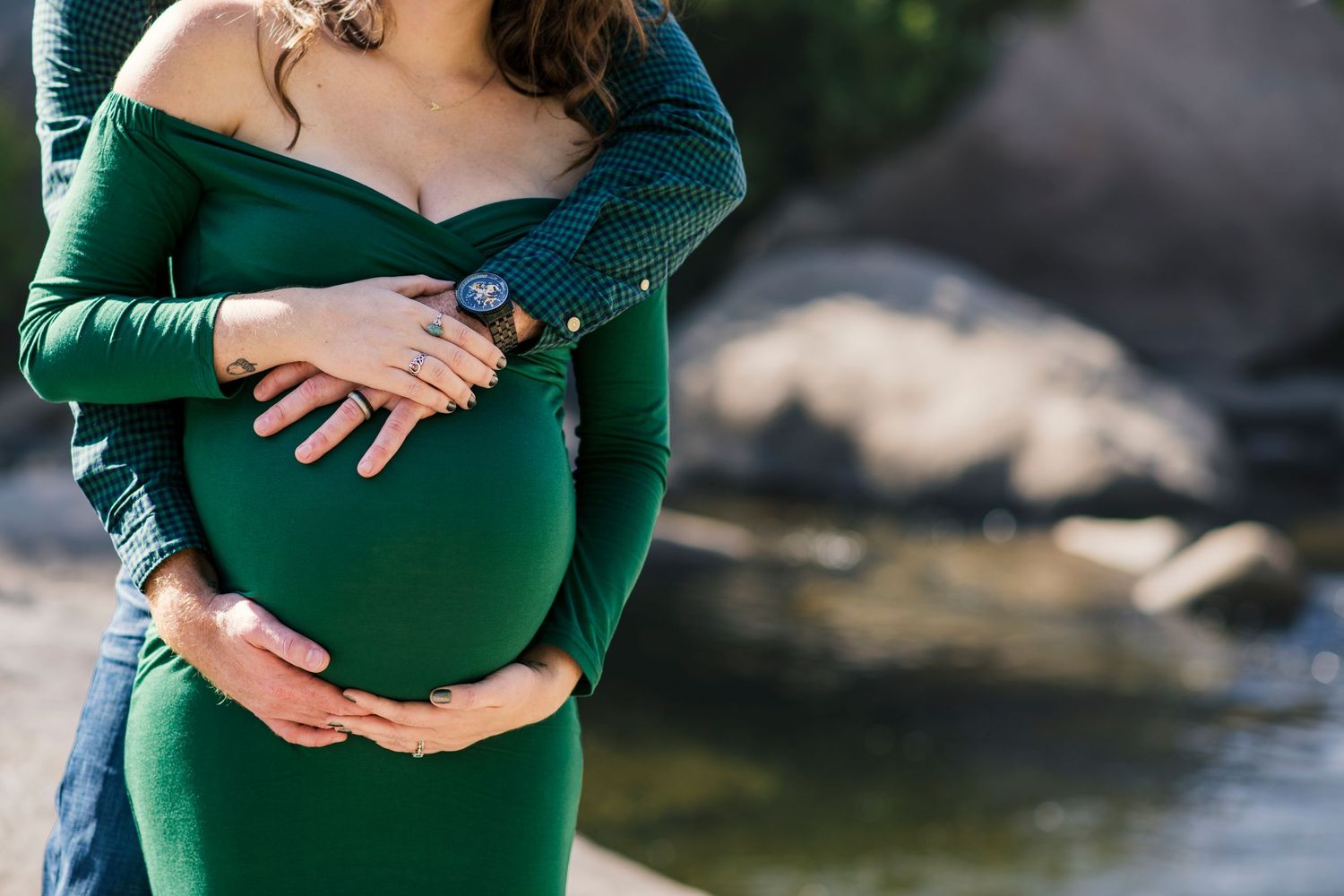 maternity photo with dad and mom and belly.
