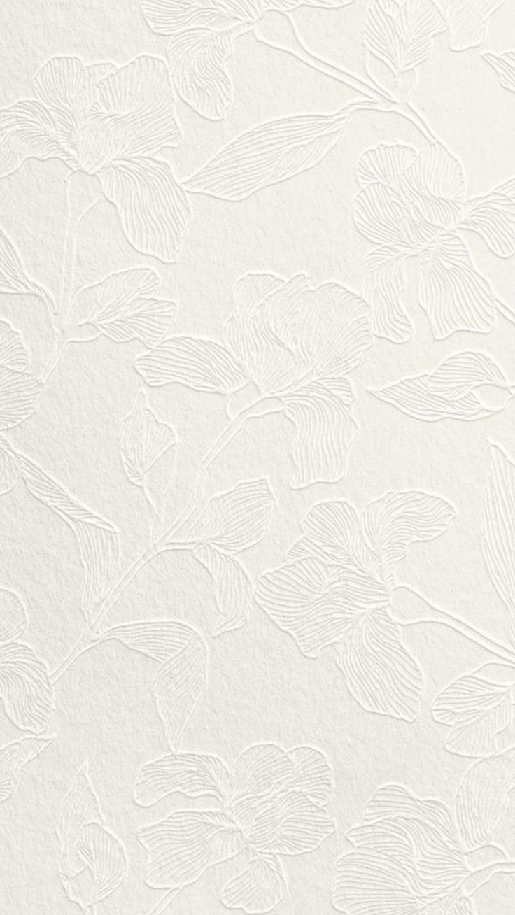 White embossed floral pattern texture on cream paper background.