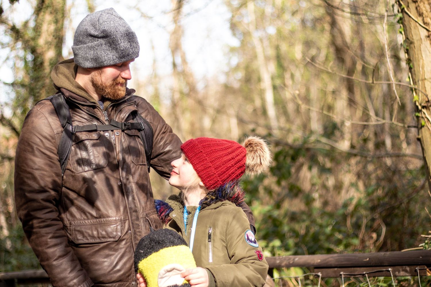 A winter scene of two people enjoying time together outdoors.