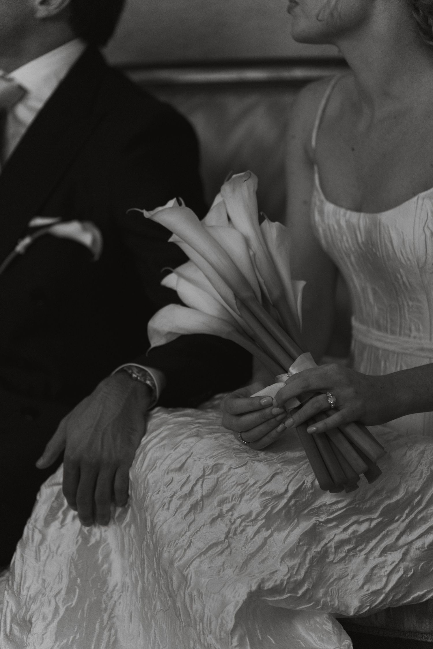 A black-and-white detail of intertwined hands. Timeless, intimate, and editorial in its simplicity.