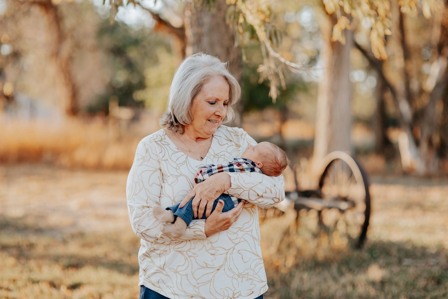 A grandma and her grand baby take in the moment together during golden hour in nebraska during a family session
