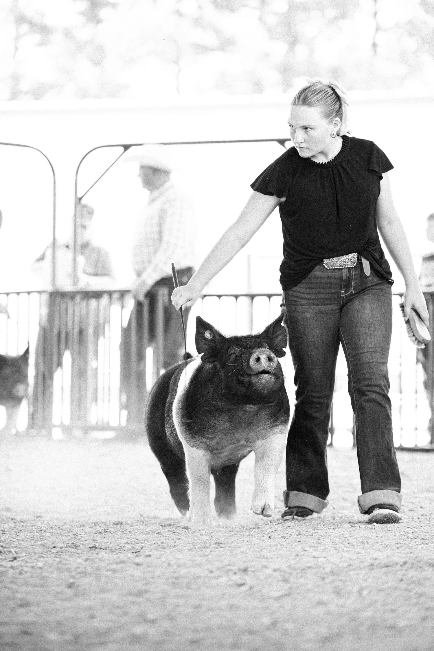 Black and white photo. of a swine showman in Kimball,NE