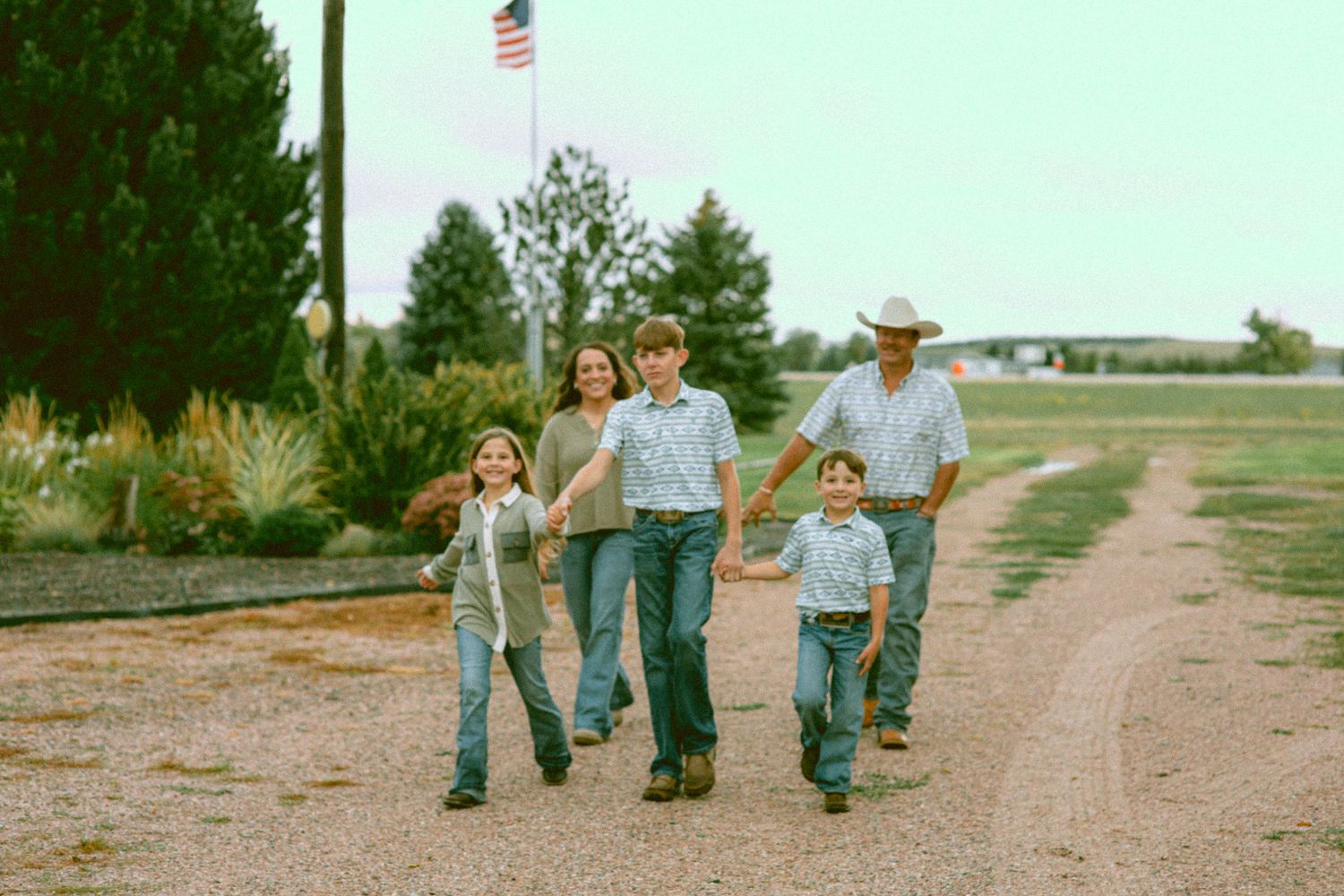 lifestyle family photography emphasizing love, land, and togetherness in nebraska