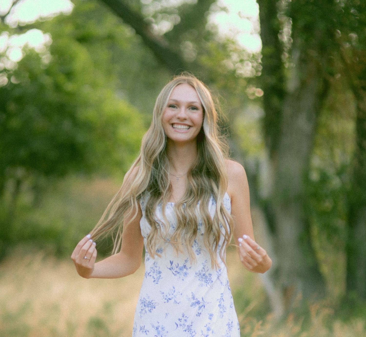 A high school senior posing for senior portraits in western nebraska