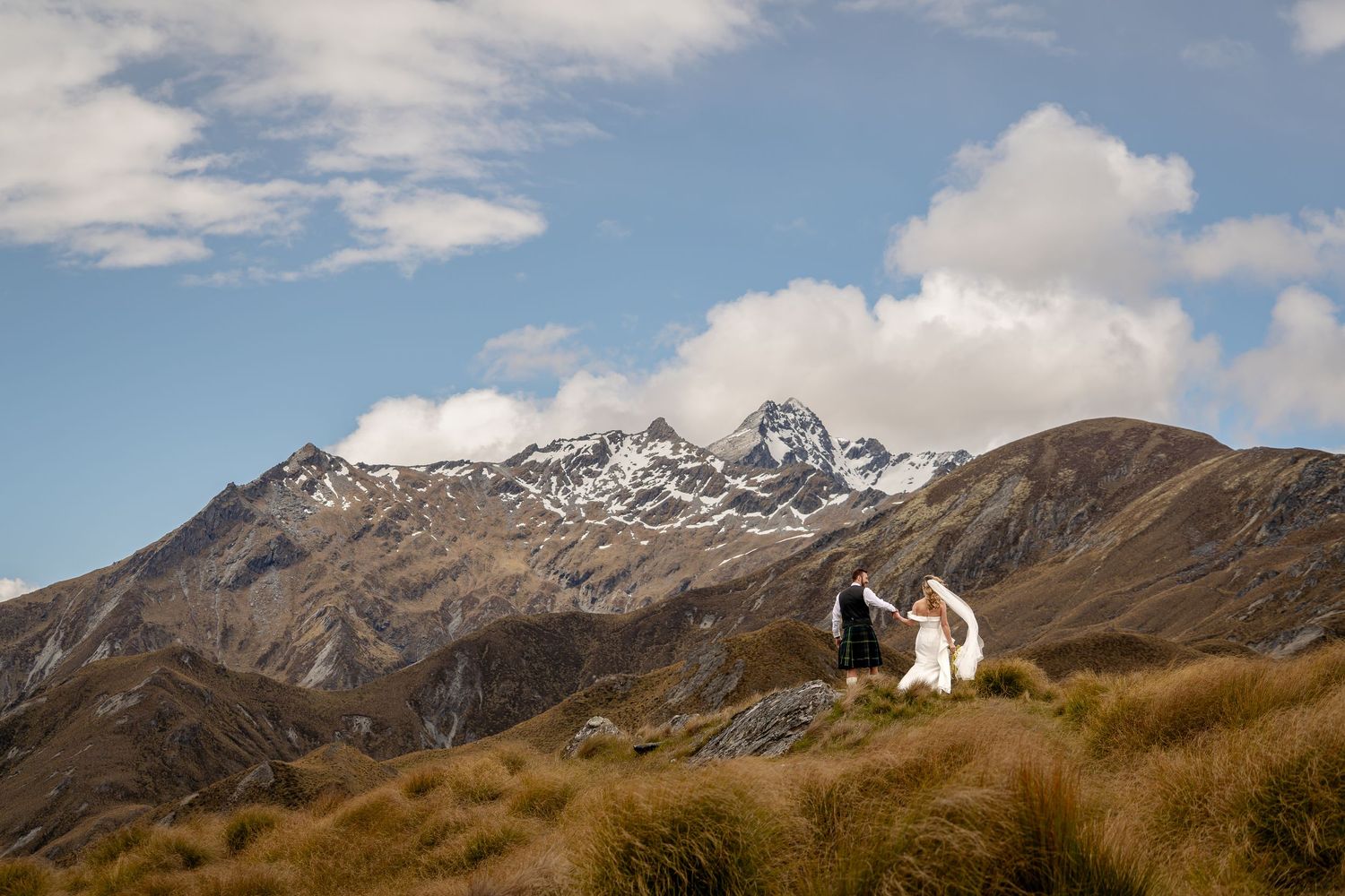 Bride and Groom portrait in mountains, Queenstown New Zealand.