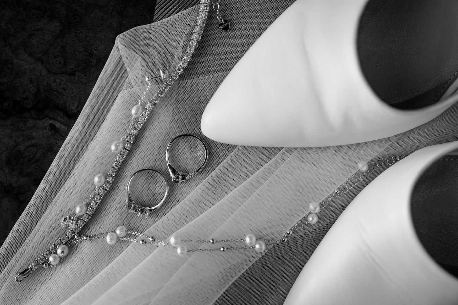 Flat lay wedding photo of shoes, veil and jewellery in Central Otago wedding.