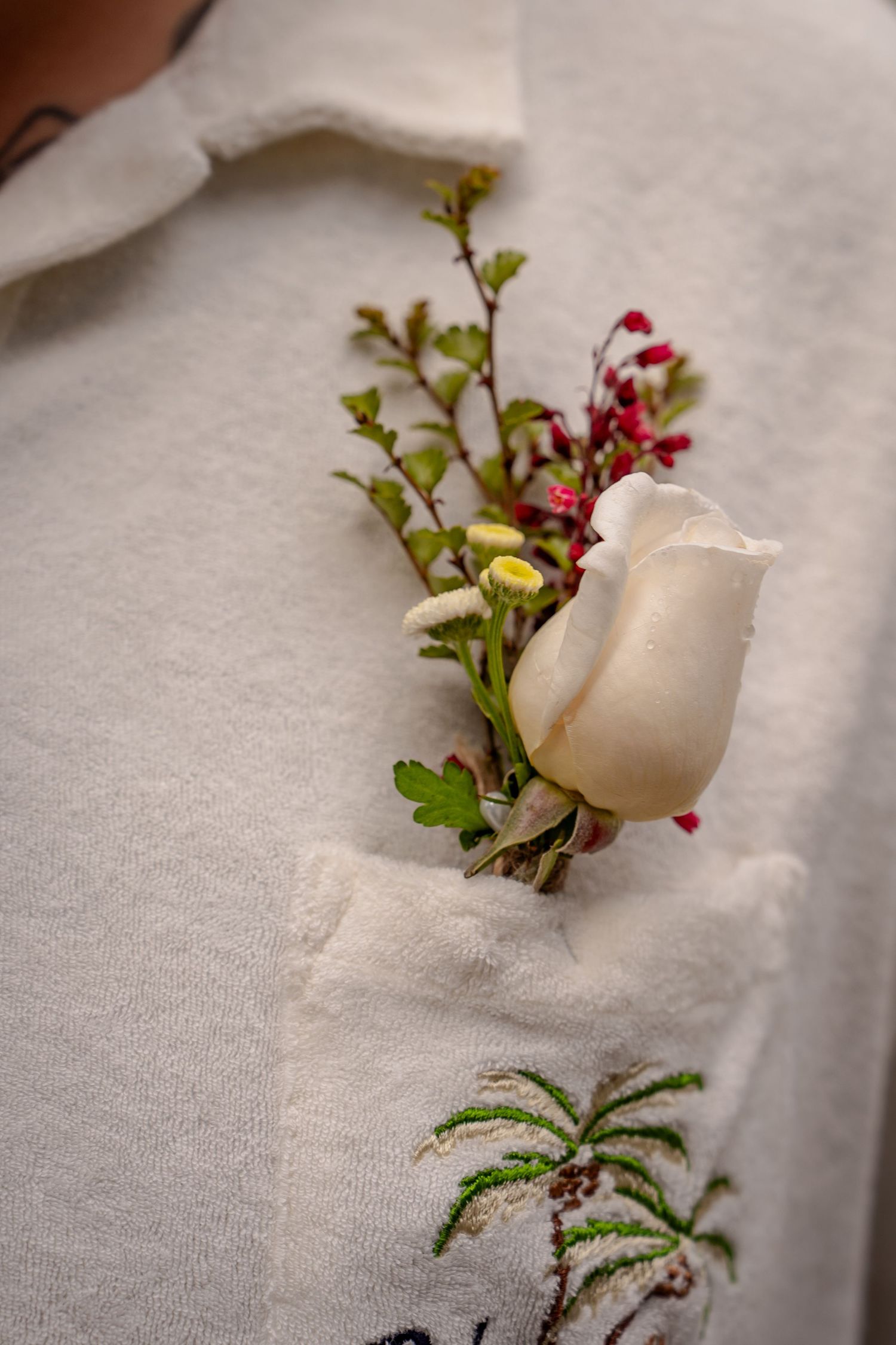 Groom wearing a buttonhole for his Queenstown elopement.