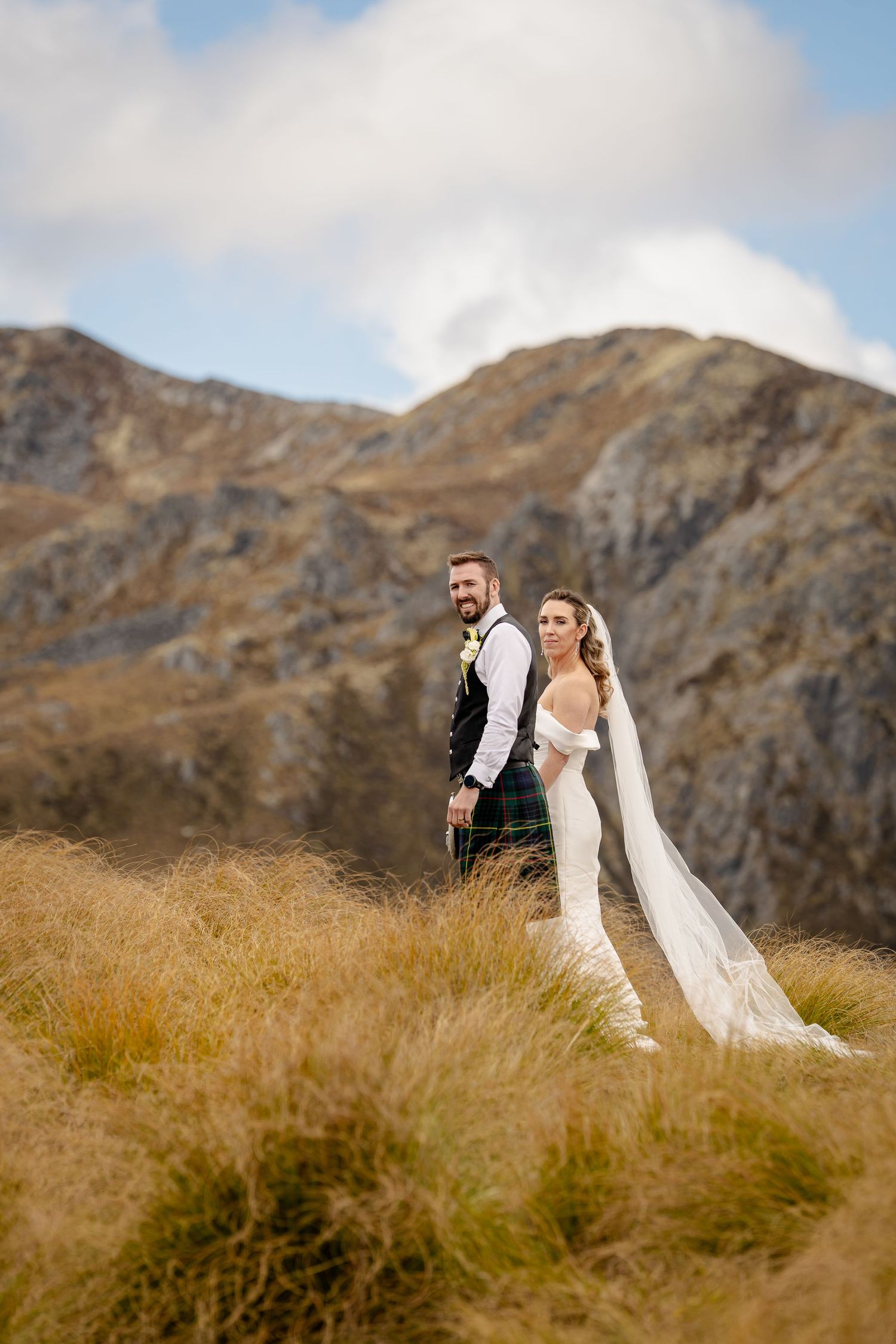 Bride and Groom portrait in mountains, Queenstown New Zealand.