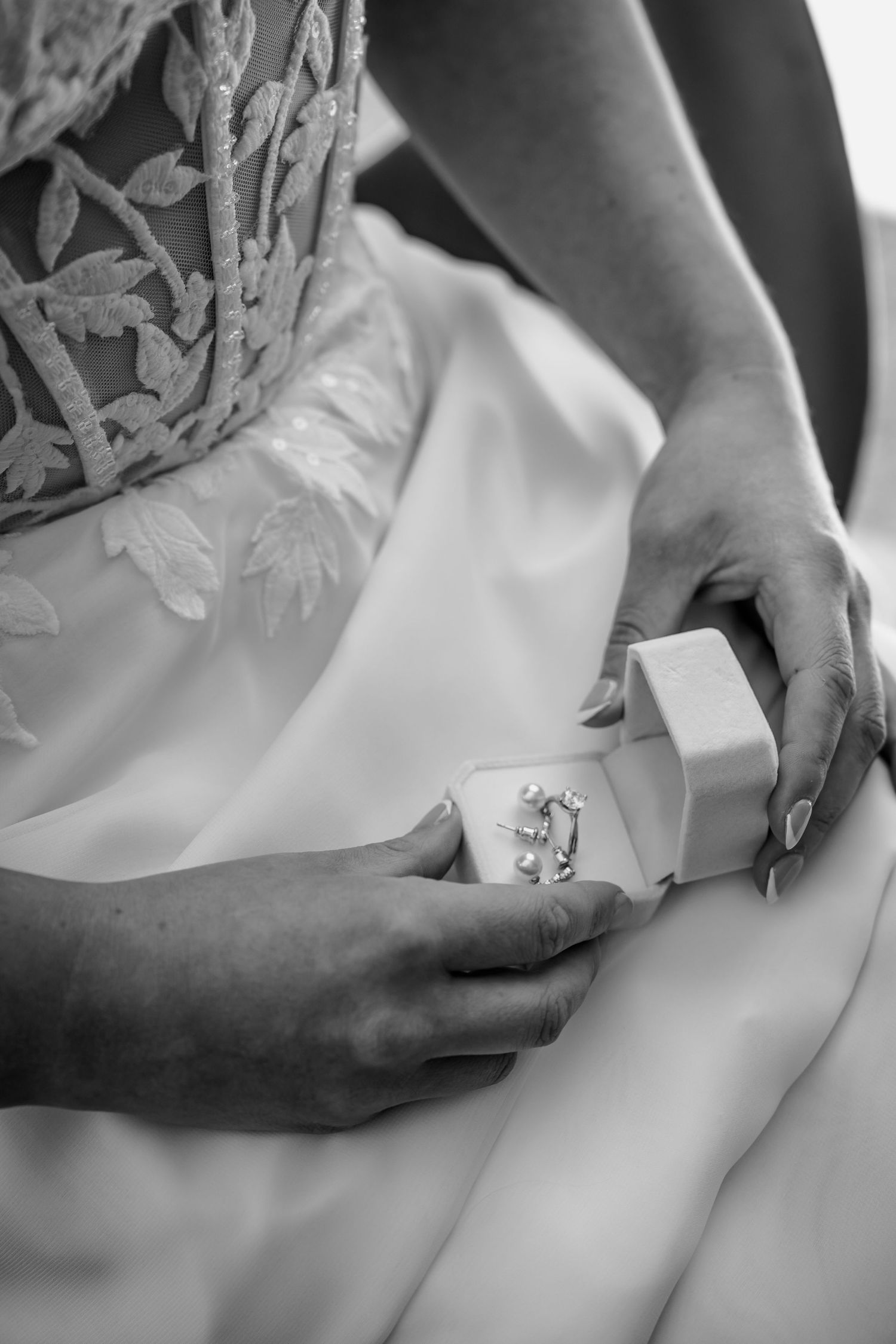 Bride holding rings for Central Otago wedding.