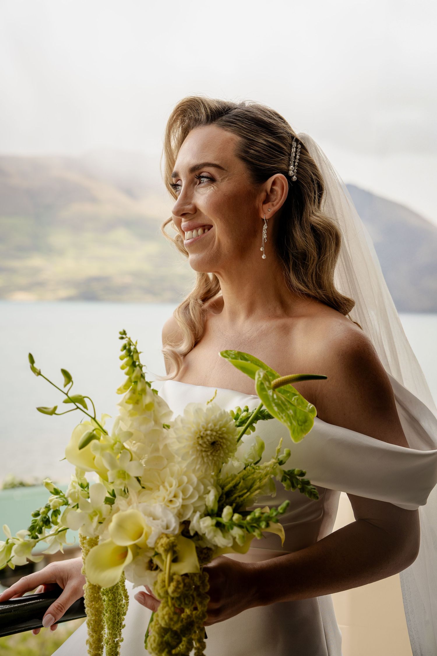 Bride with bouquet in Queenstown, New Zealand.