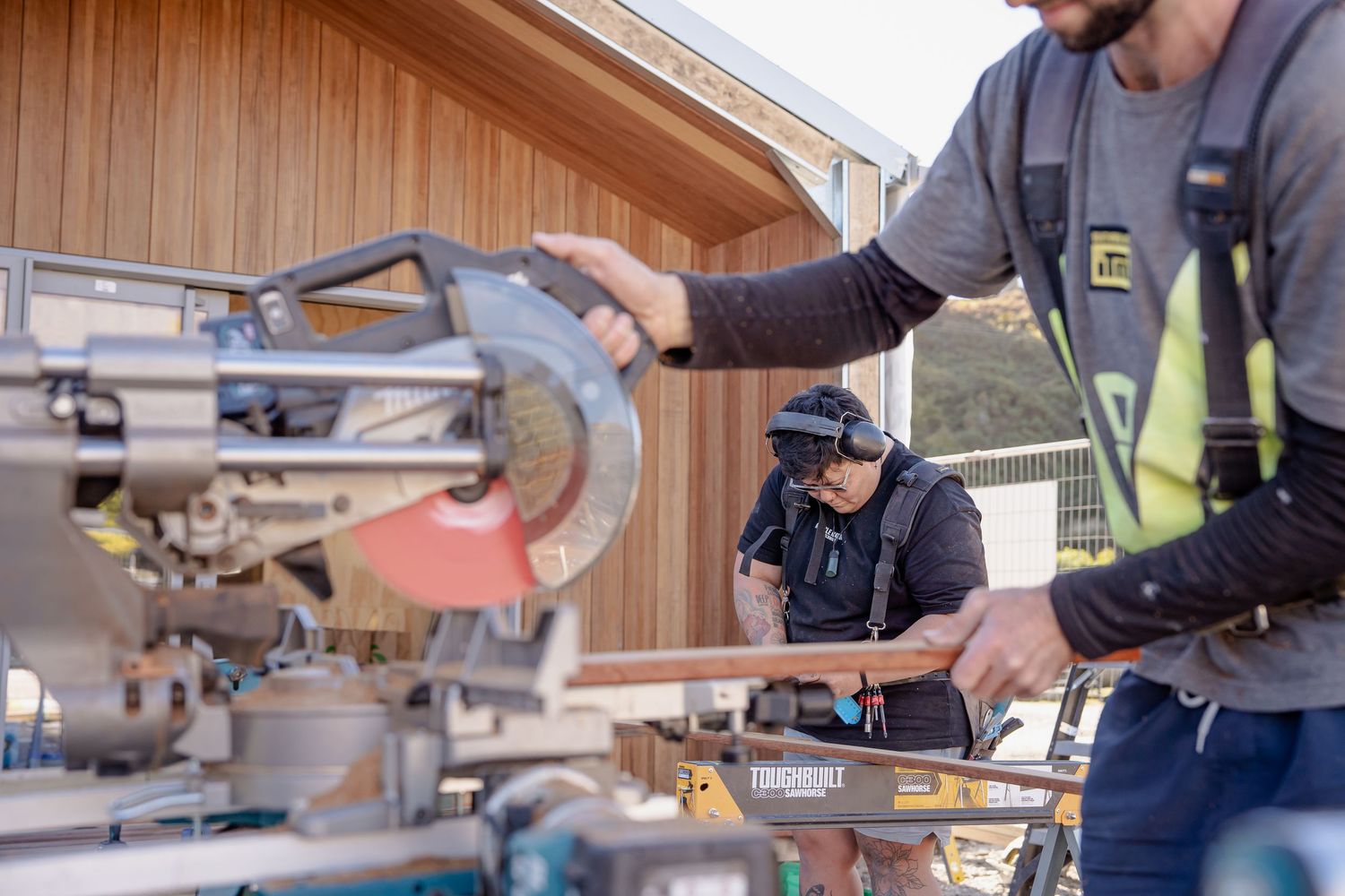 Behind the scenes content photo with woman on the tools in Queenstown.