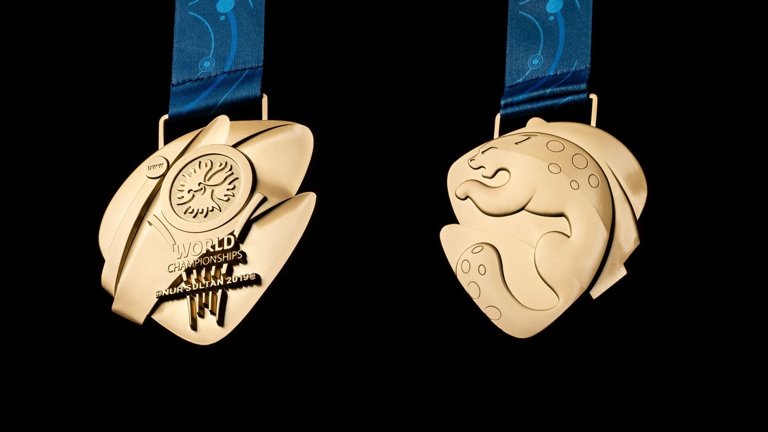 Row of circular achievement medals shown in different metallic finishes on black background.