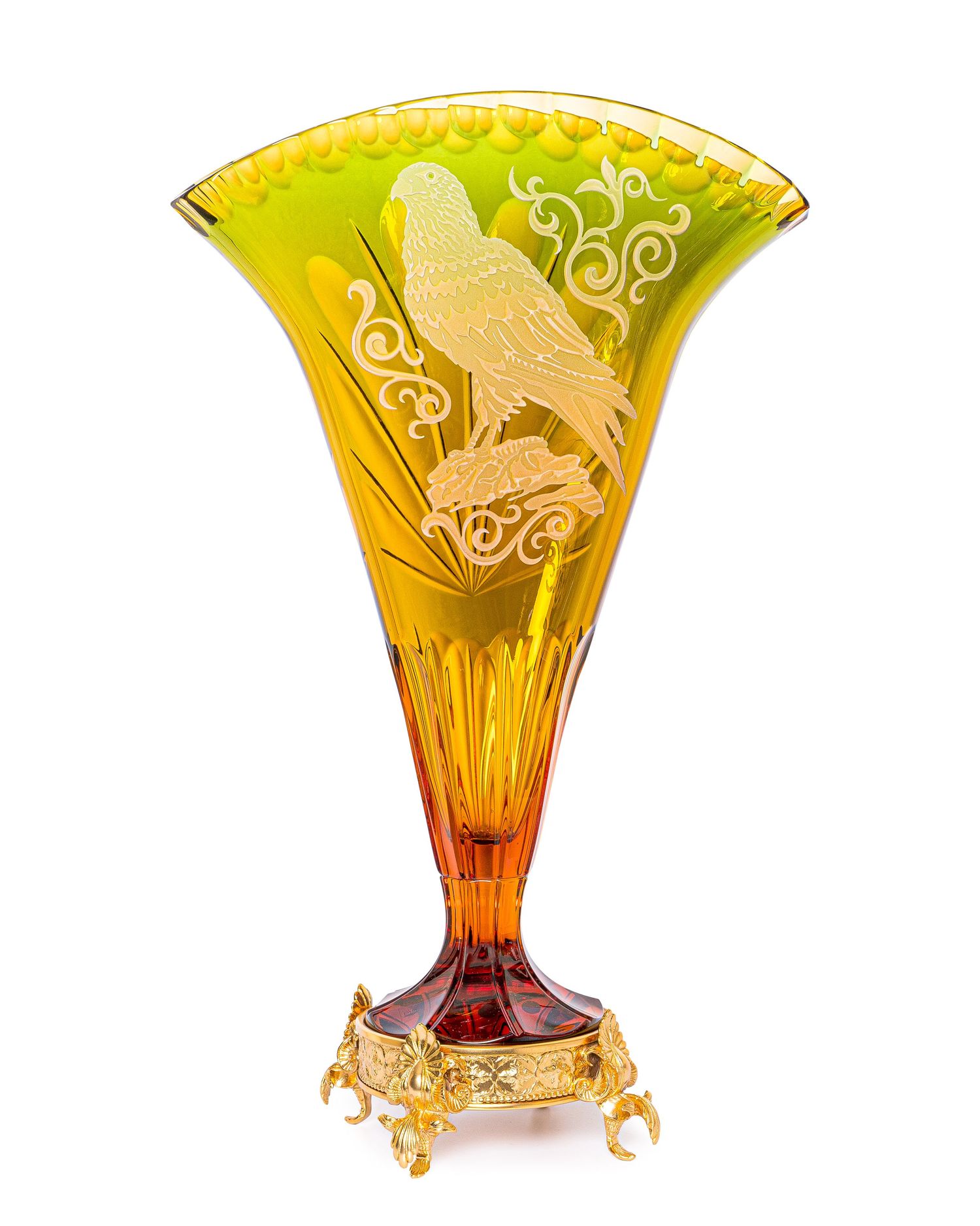 Art nouveau amber glass vase with etched bird design and metallic base.