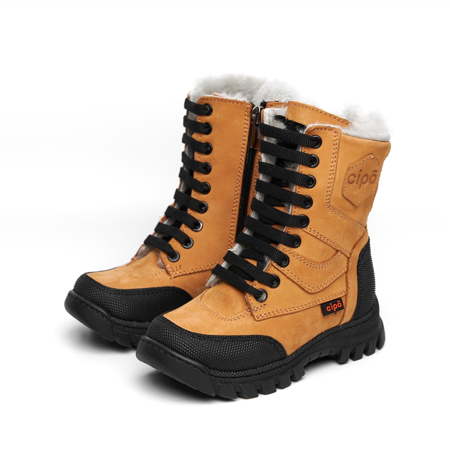 Tan leather children's boots with black laces and rubber soles shown from multiple angles.