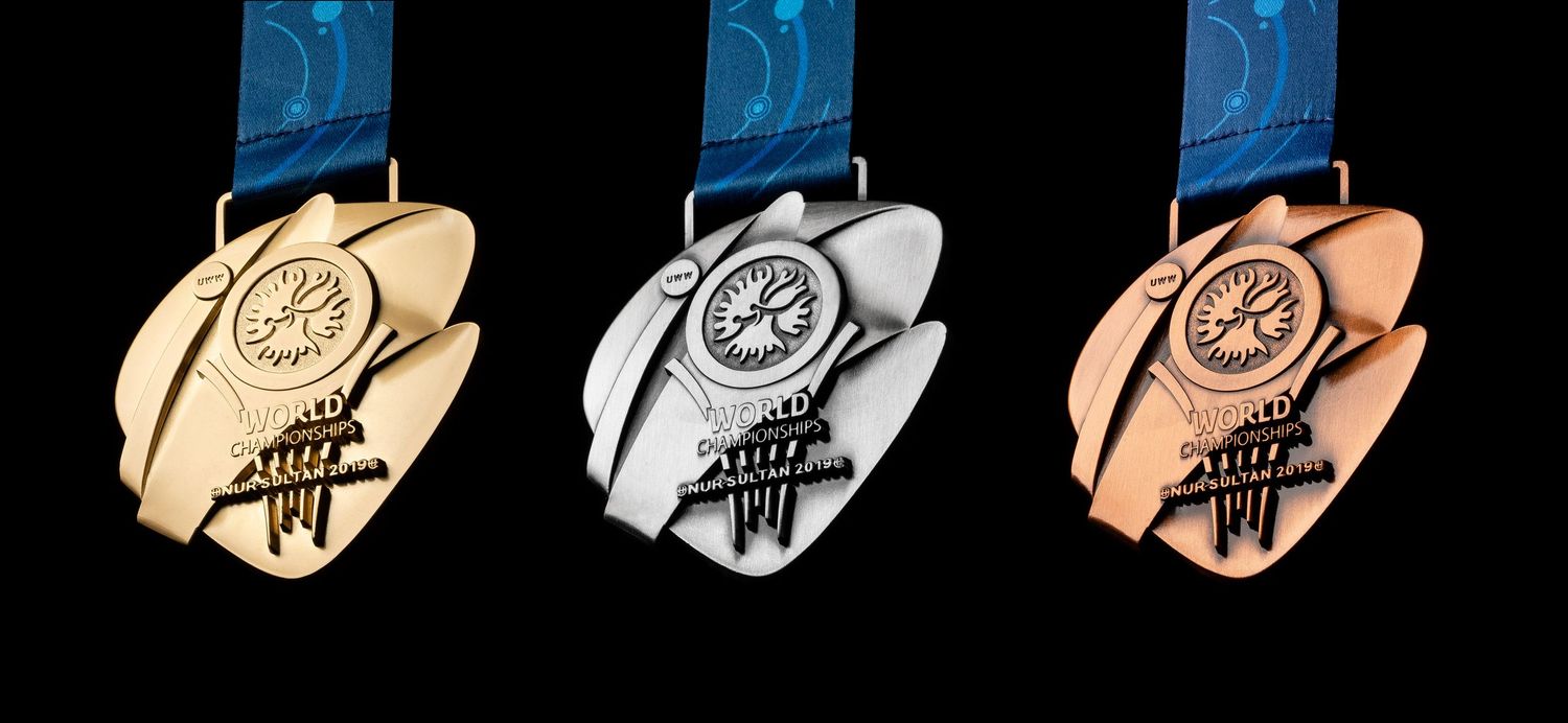 Set of blue and metallic achievement badges or medals in gold, silver and bronze variations.