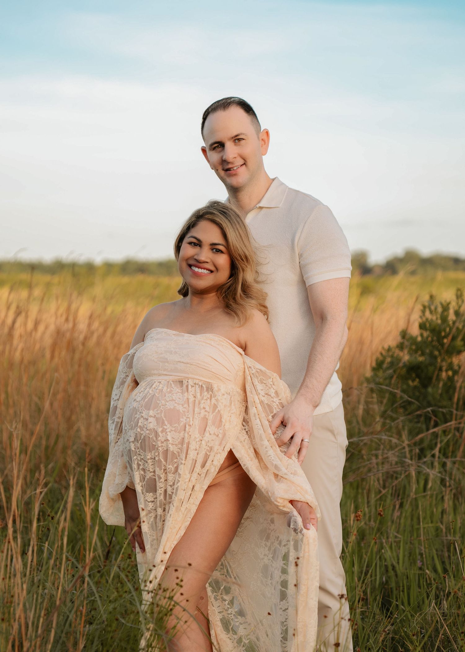 Romantic maternity session featuring an expecting mother and father-to-be at Lake Runnymede Conservation Area in St. Cloud, Florida.