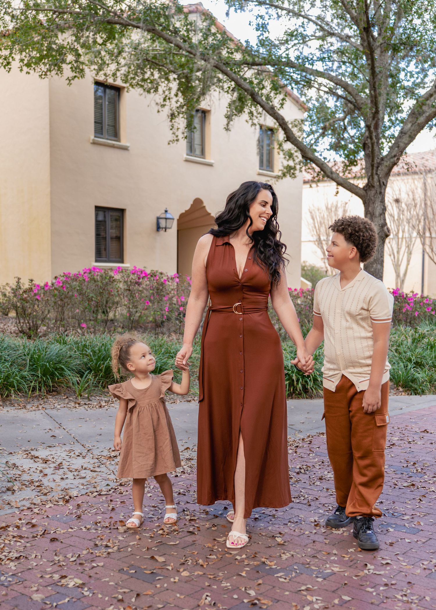 Family photography highlighting the stunning architecture and scenic campus of Rollins College in Winter Park, Florida.