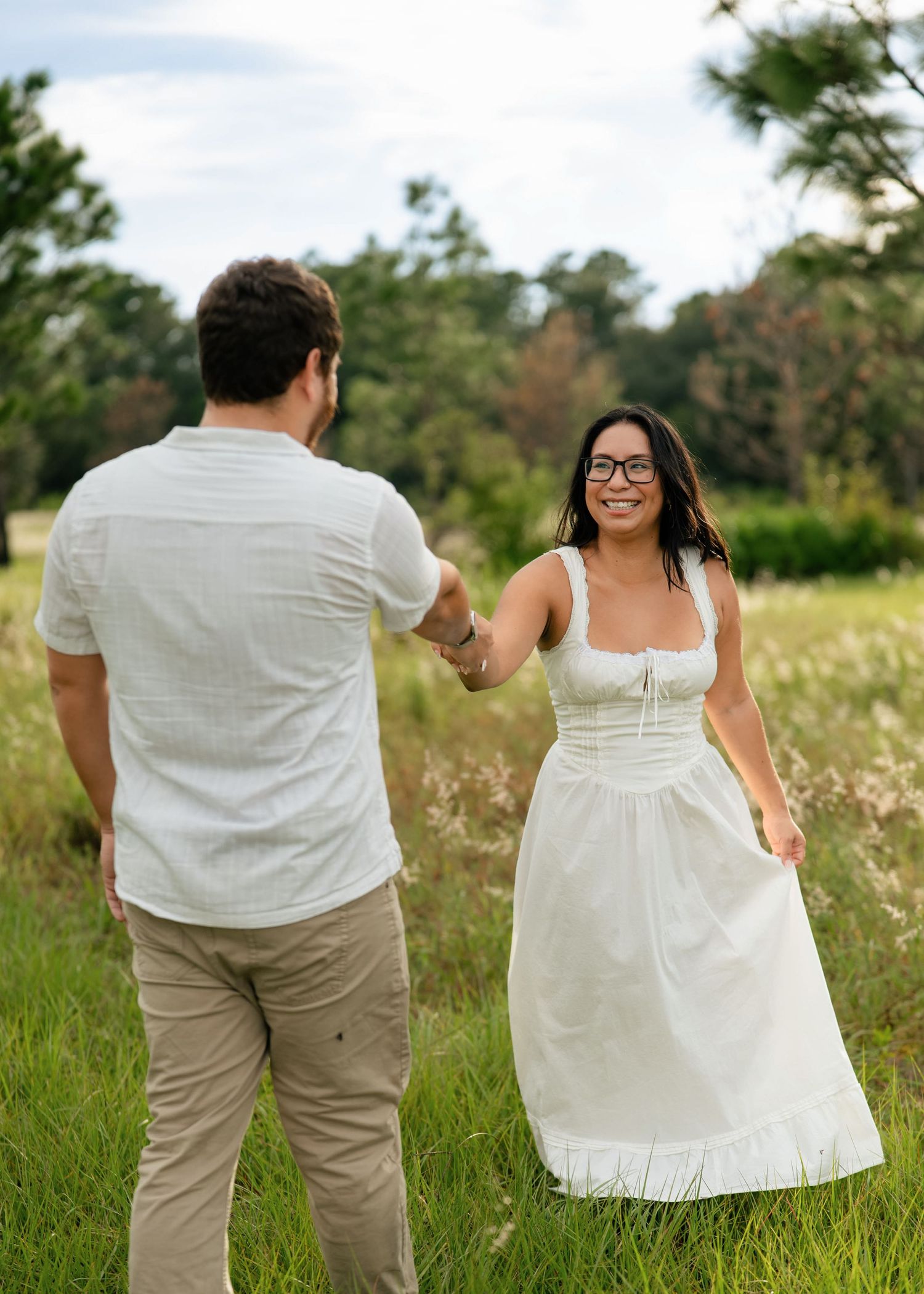 Lake Louisa State Park engagement photographer capturing candid couple moments