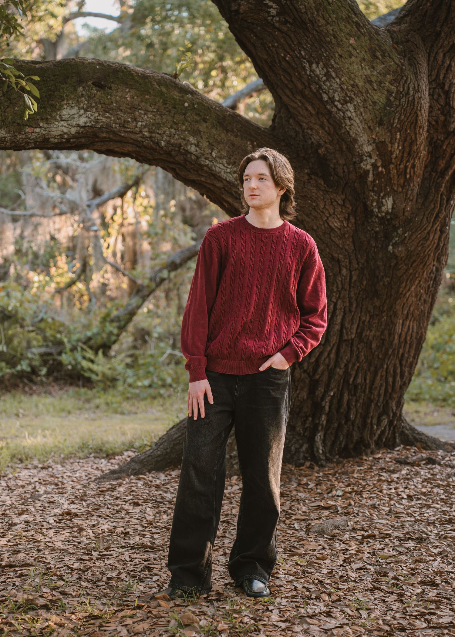 High school senior portraits captured at Lake Runnymede Conservation Area in St. Cloud, Florida.