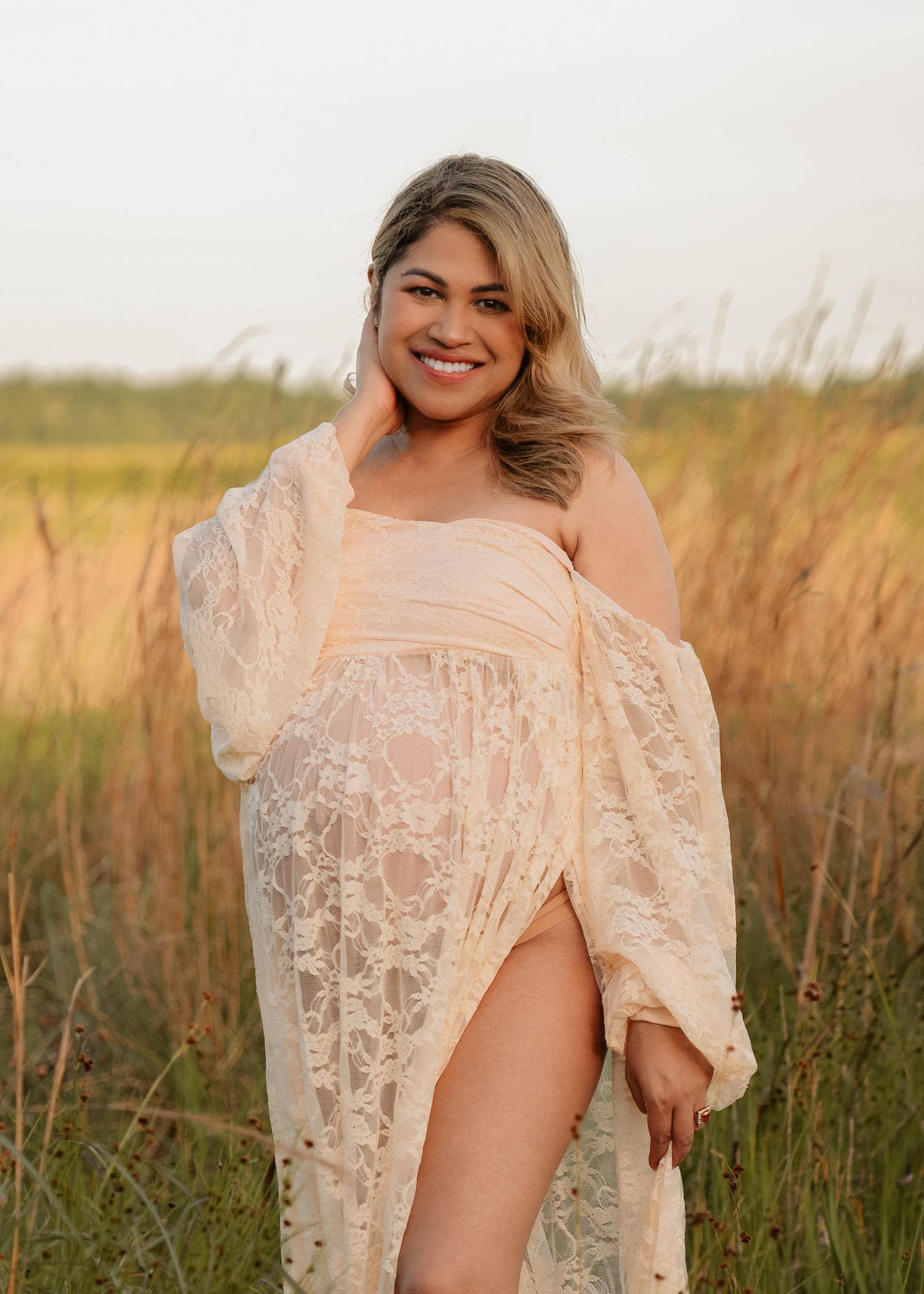 Romantic outdoor maternity portraits captured at Lake Runnymede Conservation Area, one of St. Cloud's most beautiful outdoor photography loc