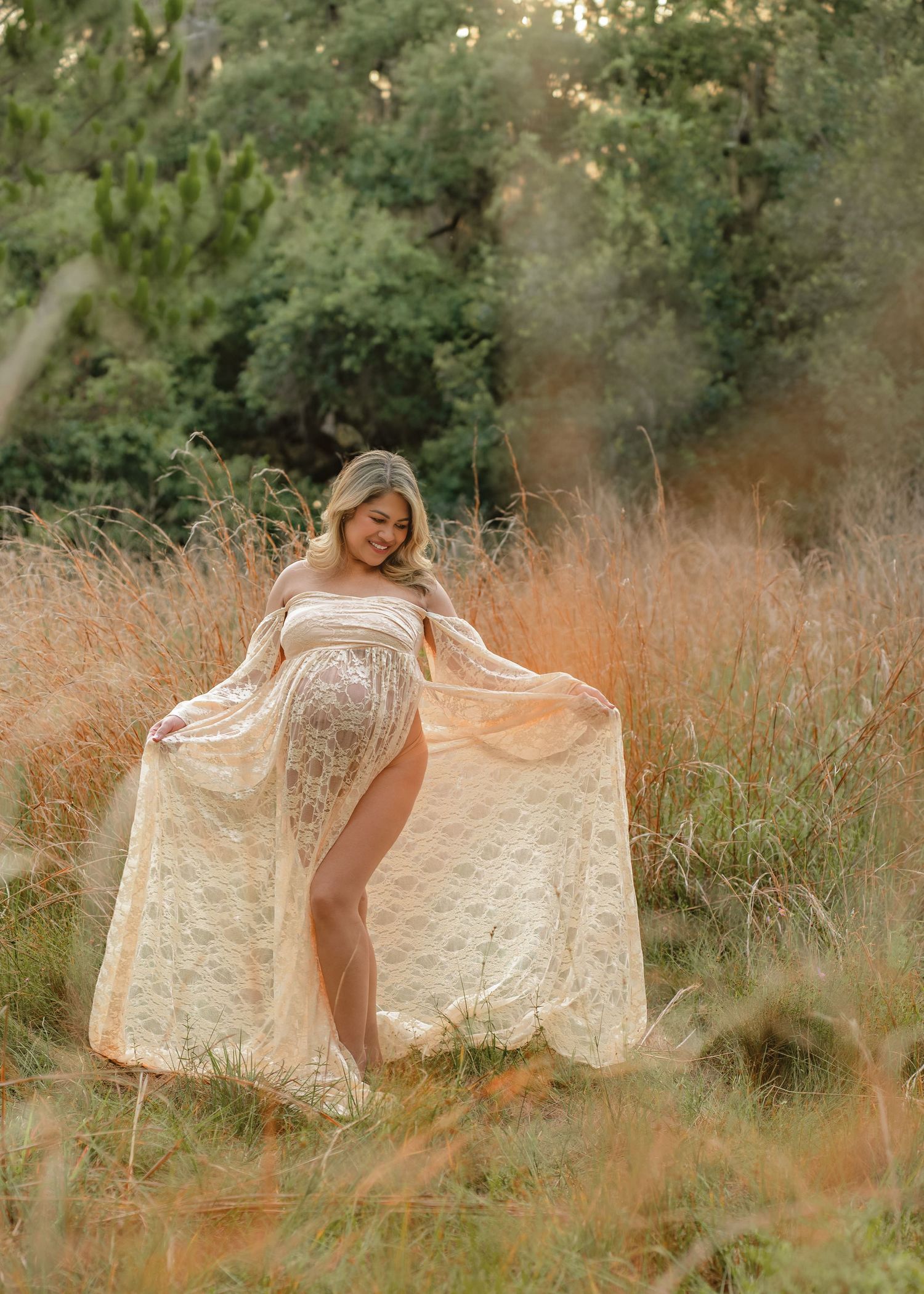 Boho maternity portraits highlighting the natural beauty of Lake Runnymede Conservation Area and the excitement of welcoming a new baby.