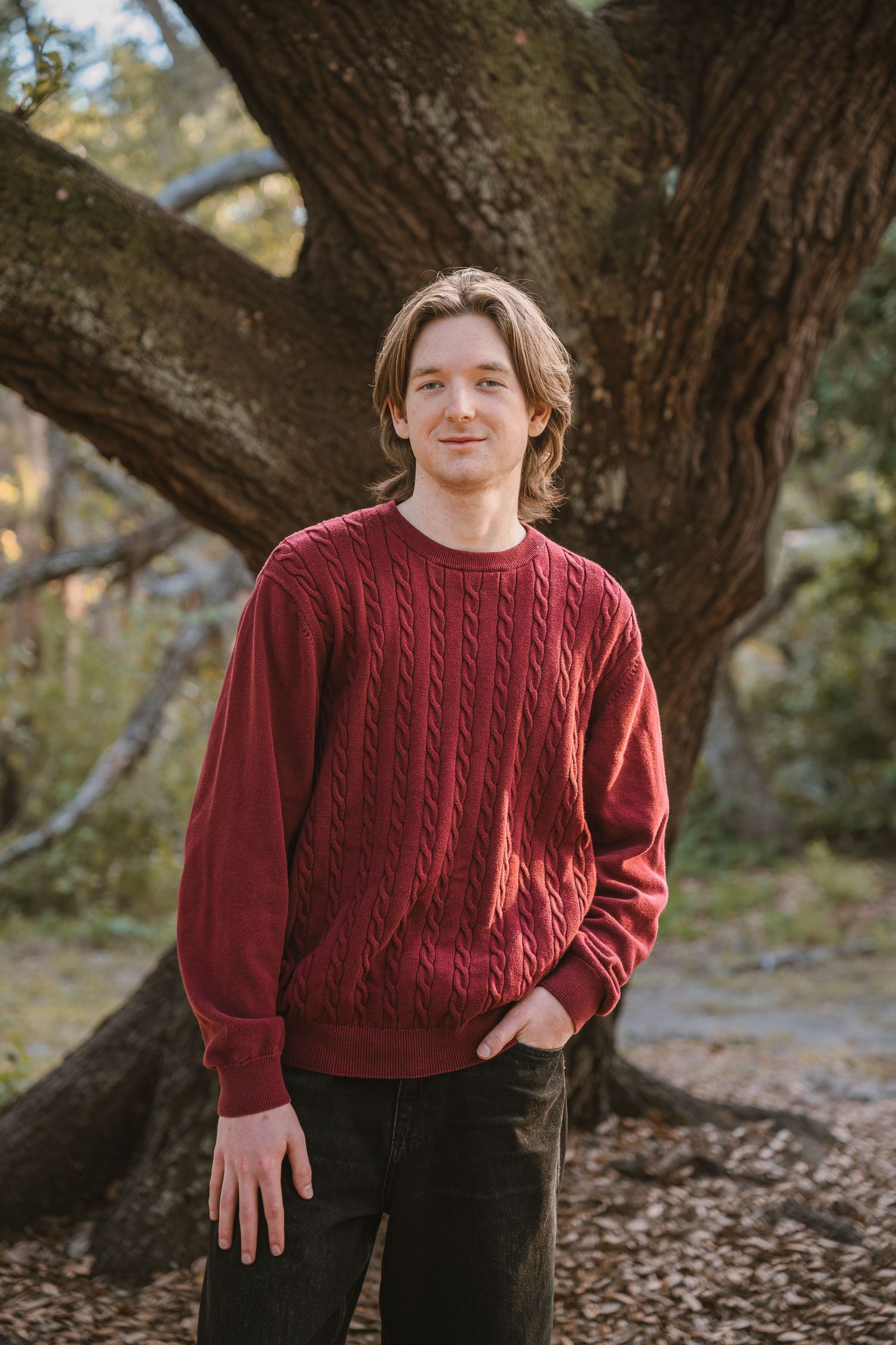 High school senior portraits captured at Lake Runnymede Conservation Area in St. Cloud, Florida.