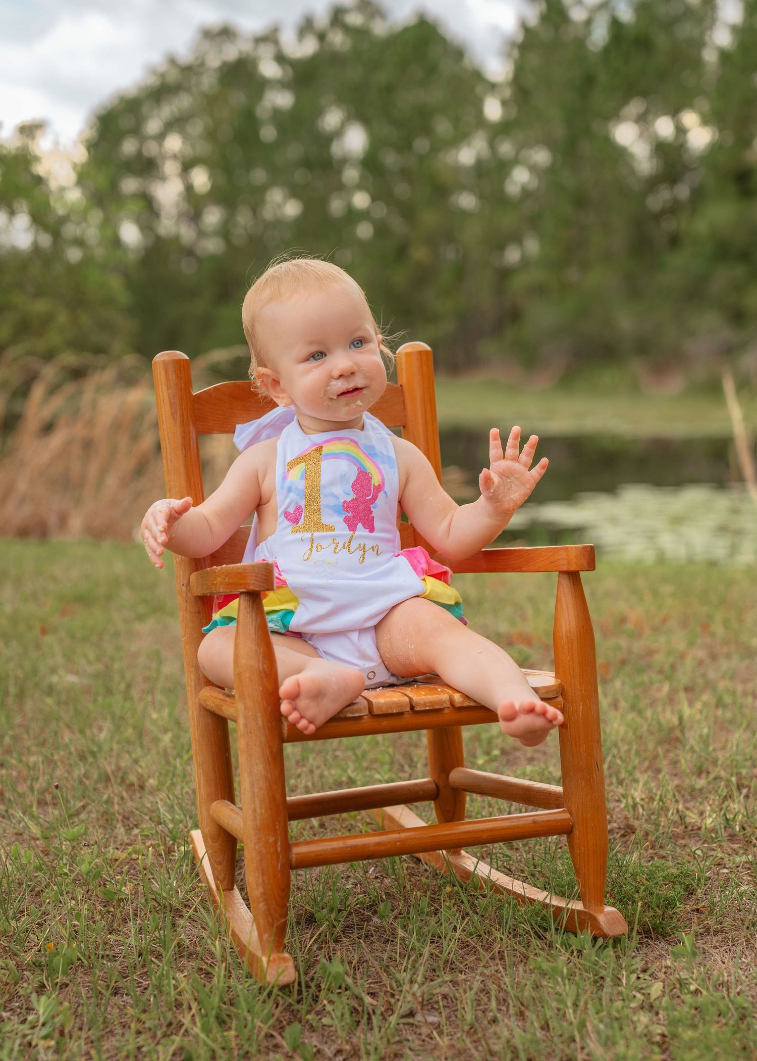 First birthday portraits celebrating girl's milestone in St. Cloud, Florida by family photographer