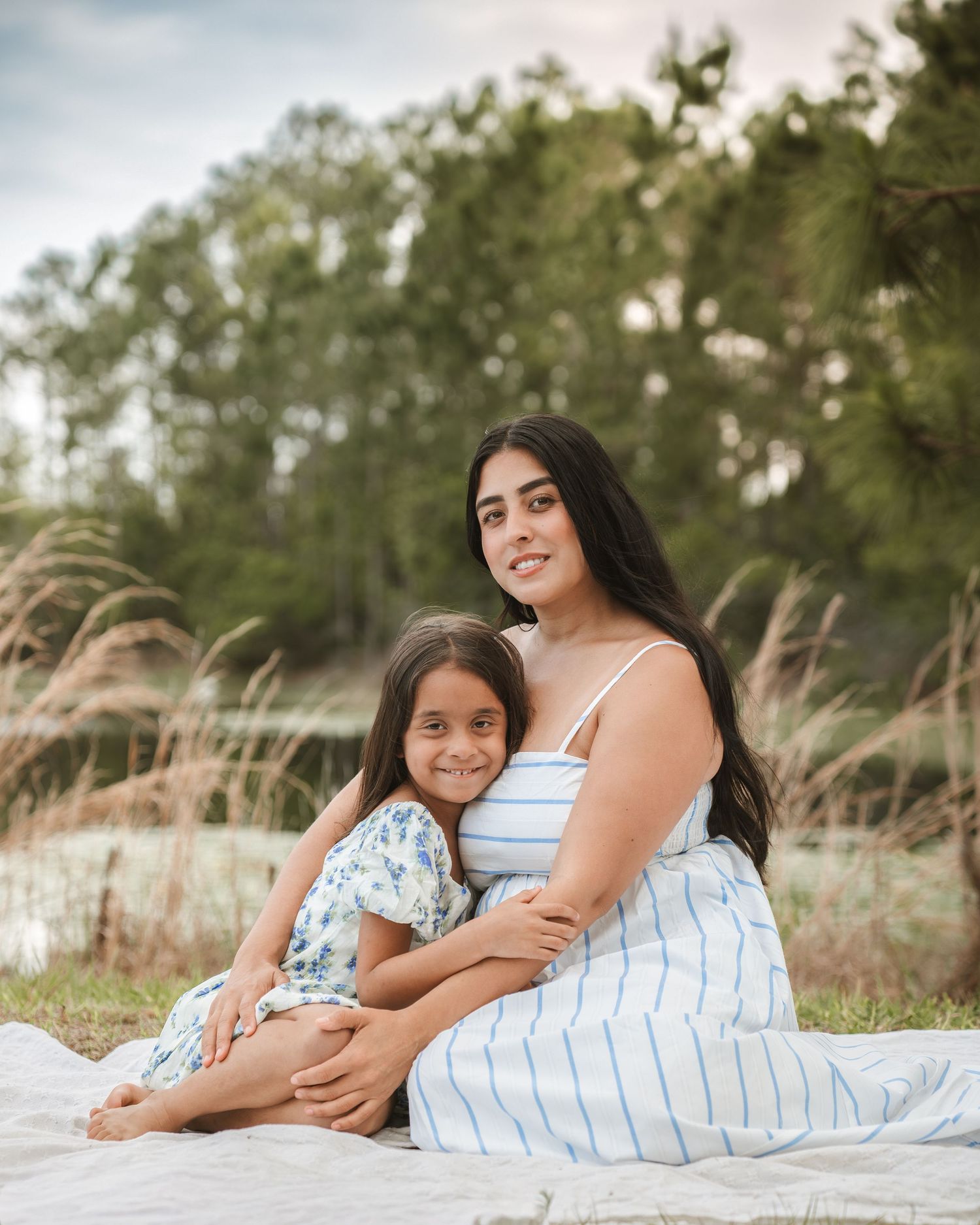 Lifestyle family photography portraits capturing authentic moments between mom and her children by Orlando family photographer