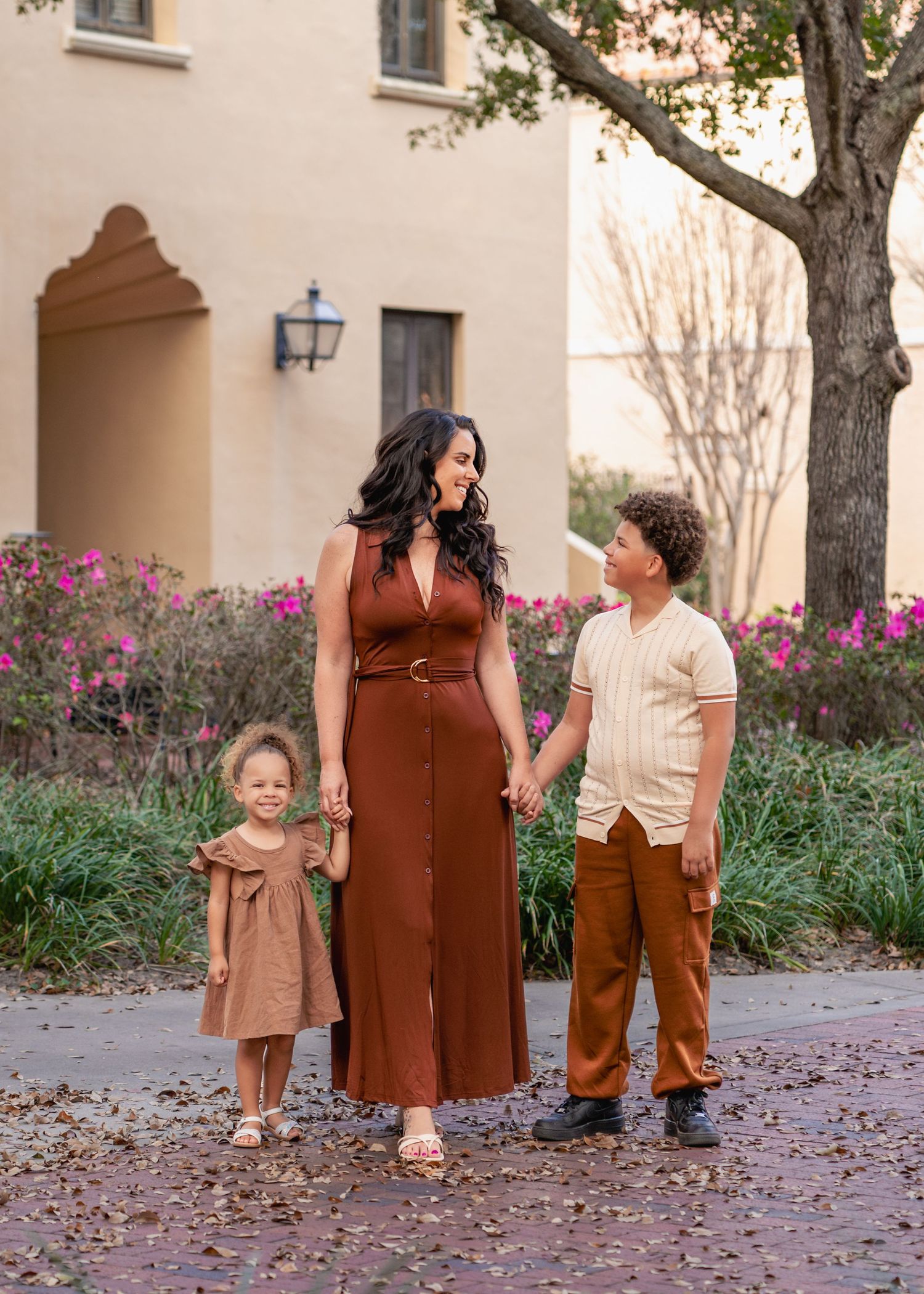 Outdoor family portraits surrounded by the beautiful architecture of Rollins College in Winter Park.