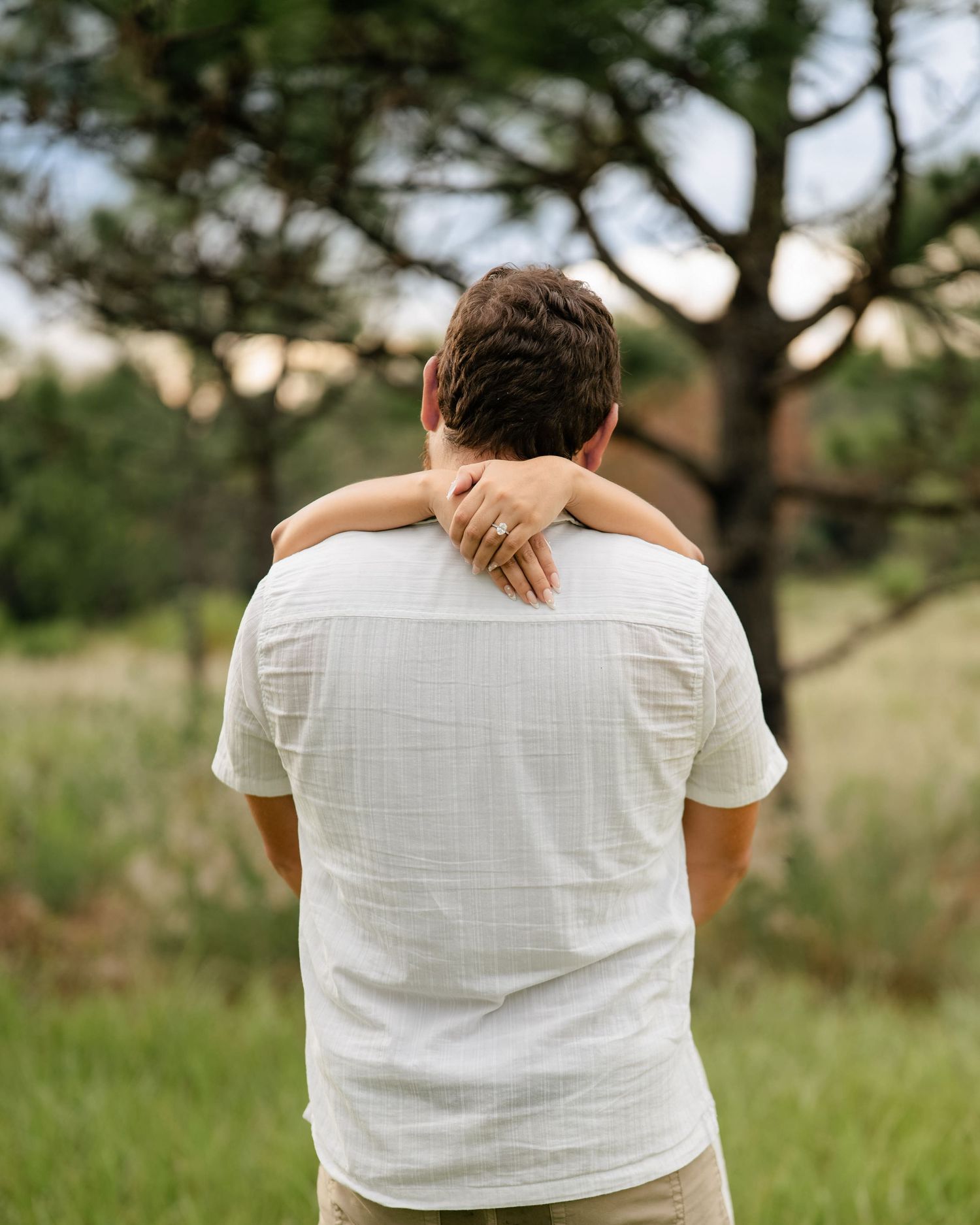 Couple enjoying a romantic engagement session at Lake Louisa State Park