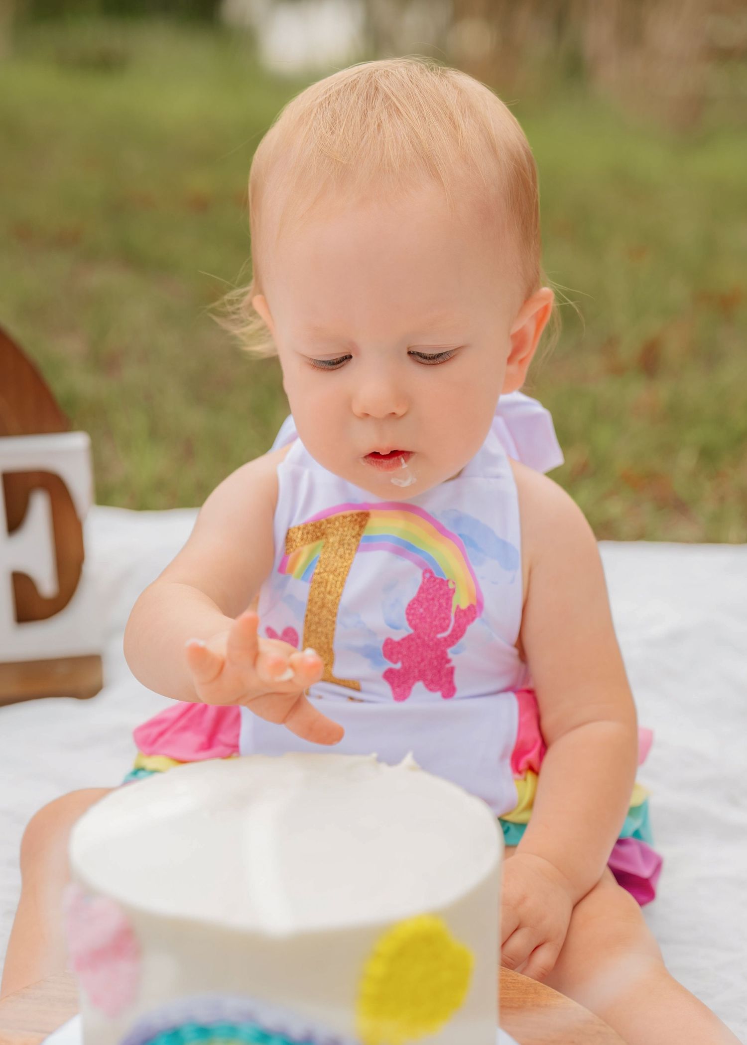 Timeless cake smash photography documenting a first birthday celebration in St Cloud Florida