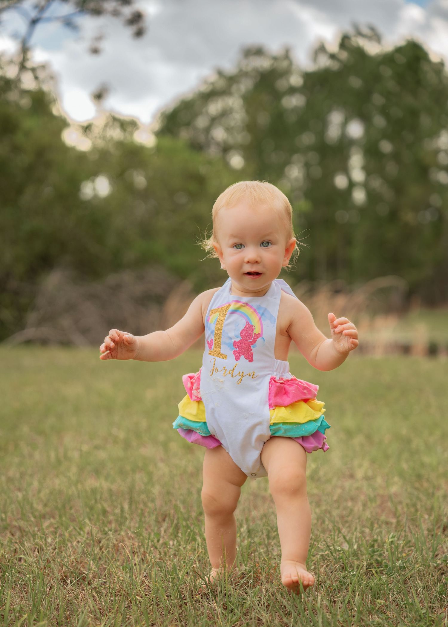 First birthday portraits celebrating girl's milestone in St. Cloud, Florida by family photographer