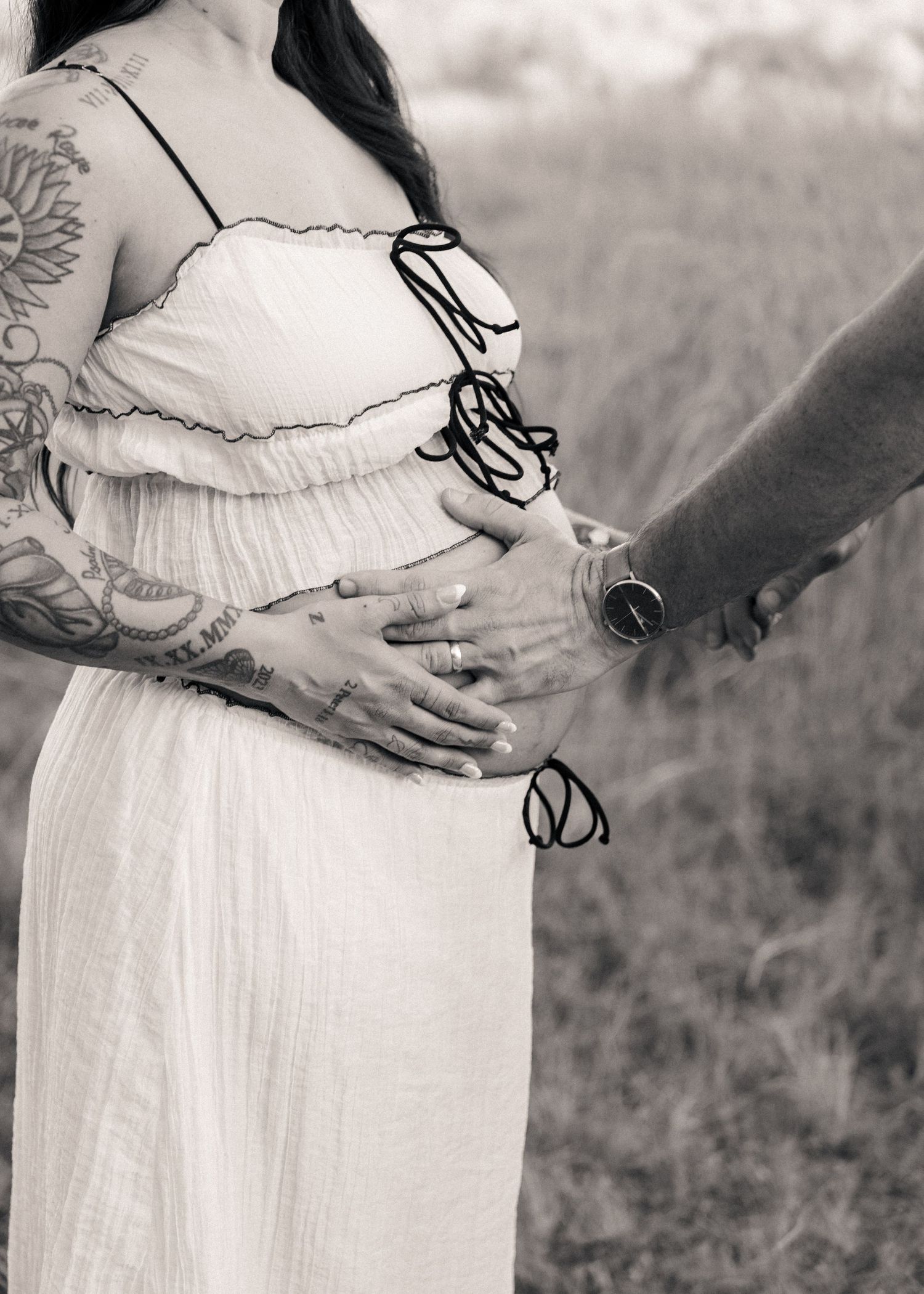 Warm and natural maternity photography featuring an expecting couple at Lake Runnymede Conservation Area in St Cloud Florida