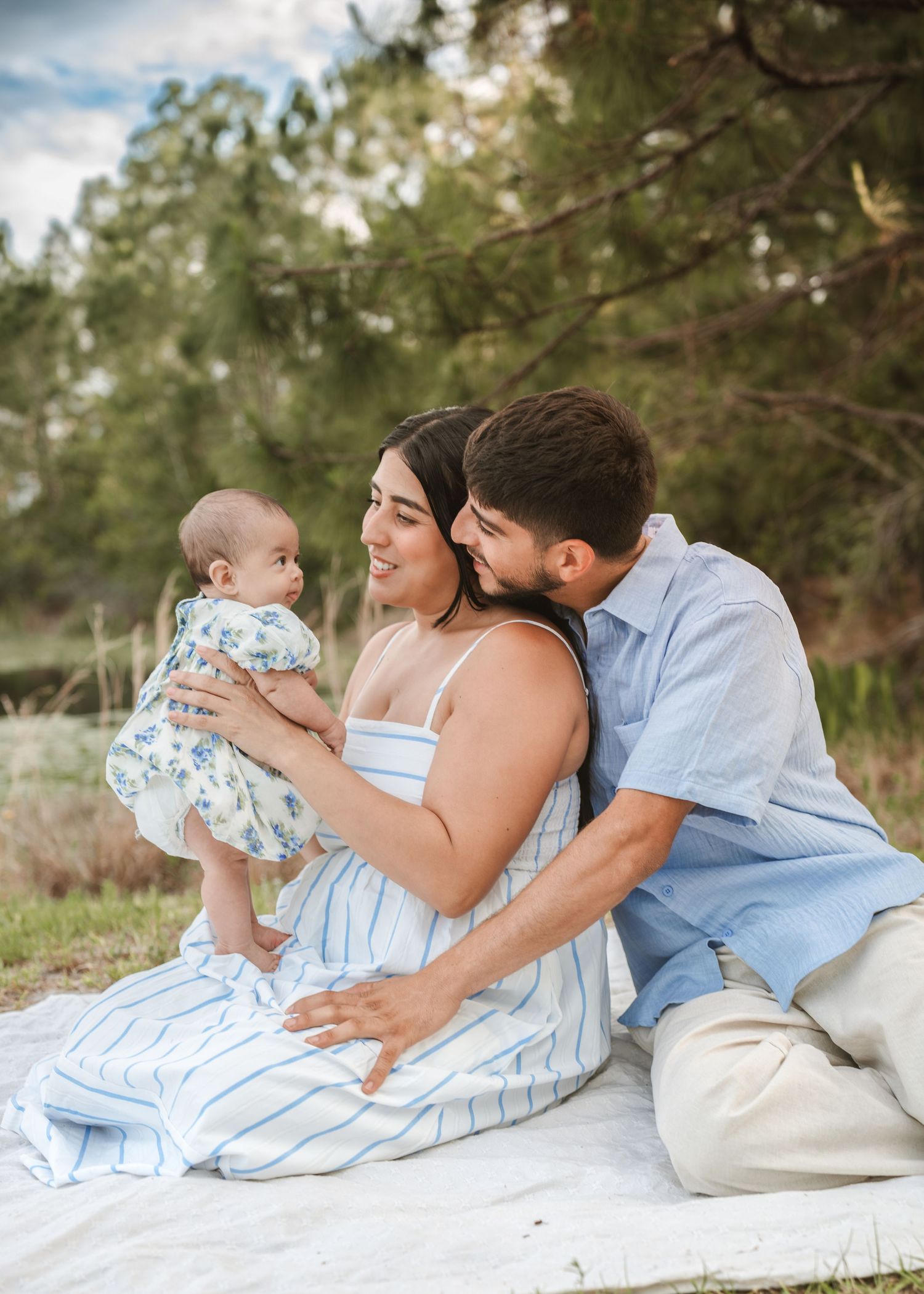 Outdoor family portraits captured in St. Cloud, Florida during a relaxed lifestyle photography session.