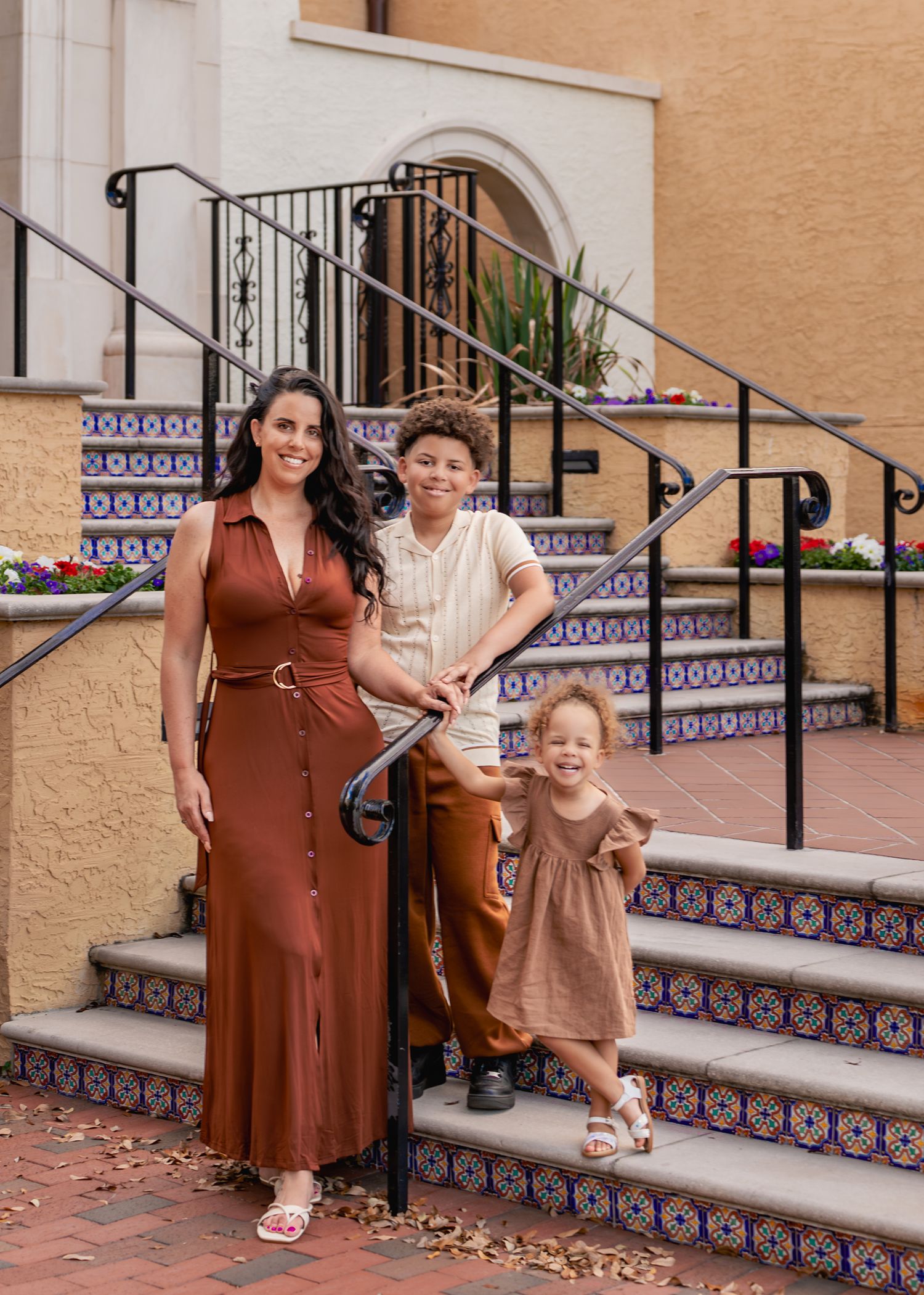 Family photography highlighting the stunning architecture and scenic campus of Rollins College in Winter Park, Florida.