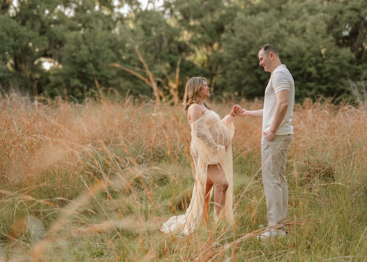 Romantic maternity session featuring an expecting mother and father-to-be at Lake Runnymede Conservation Area in St. Cloud, Florida.
