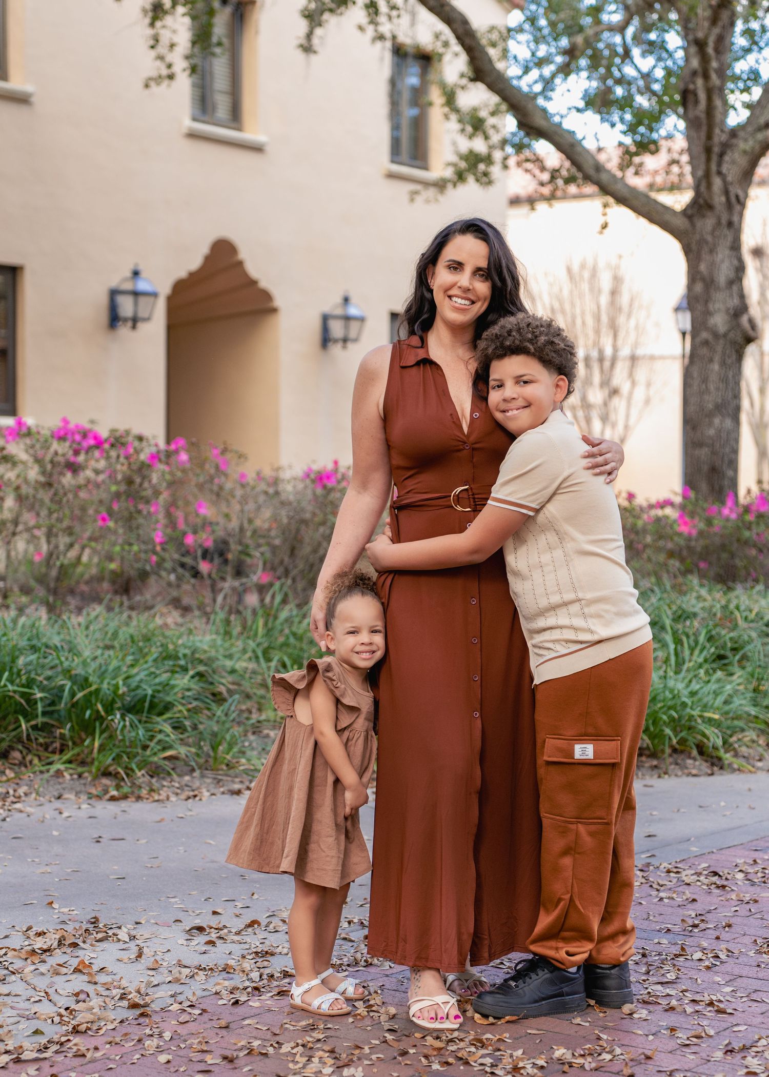 Timeless portraits of a mother and her children captured at Rollins College in Winter Park Florida.