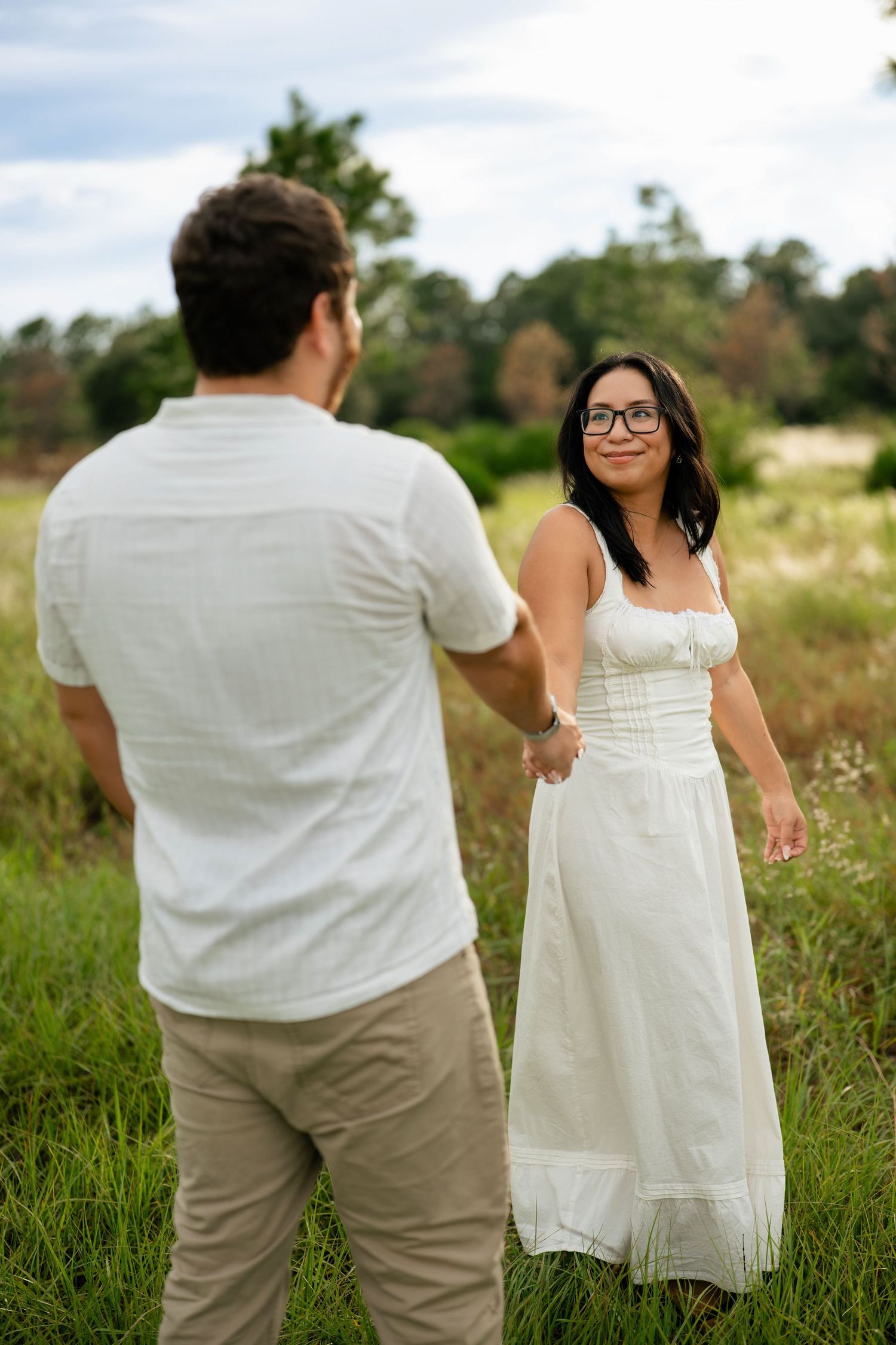 Lake Louisa State Park engagement photographer capturing candid couple moments