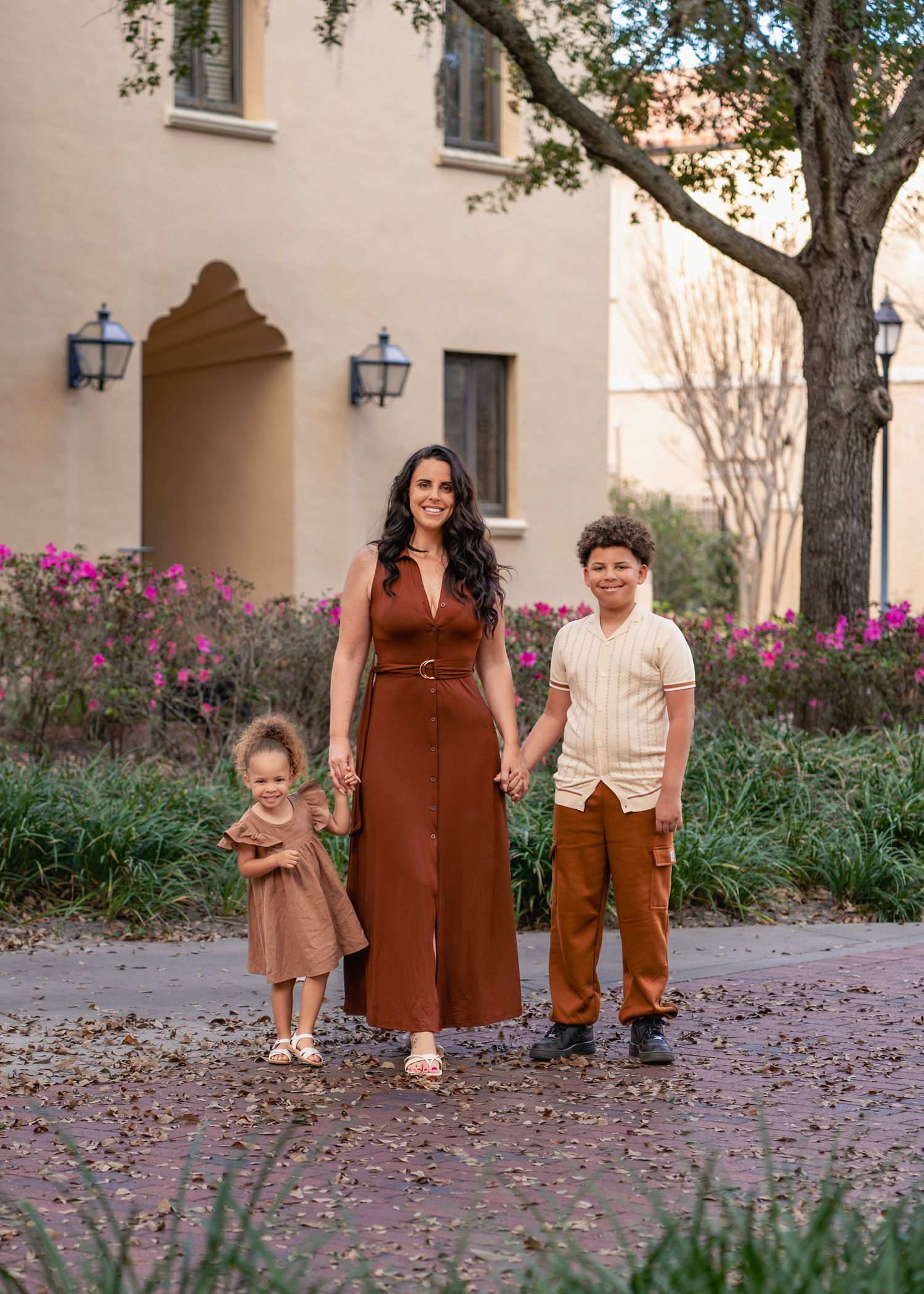 Family photography highlighting the stunning architecture and scenic campus of Rollins College in Winter Park, Florida.