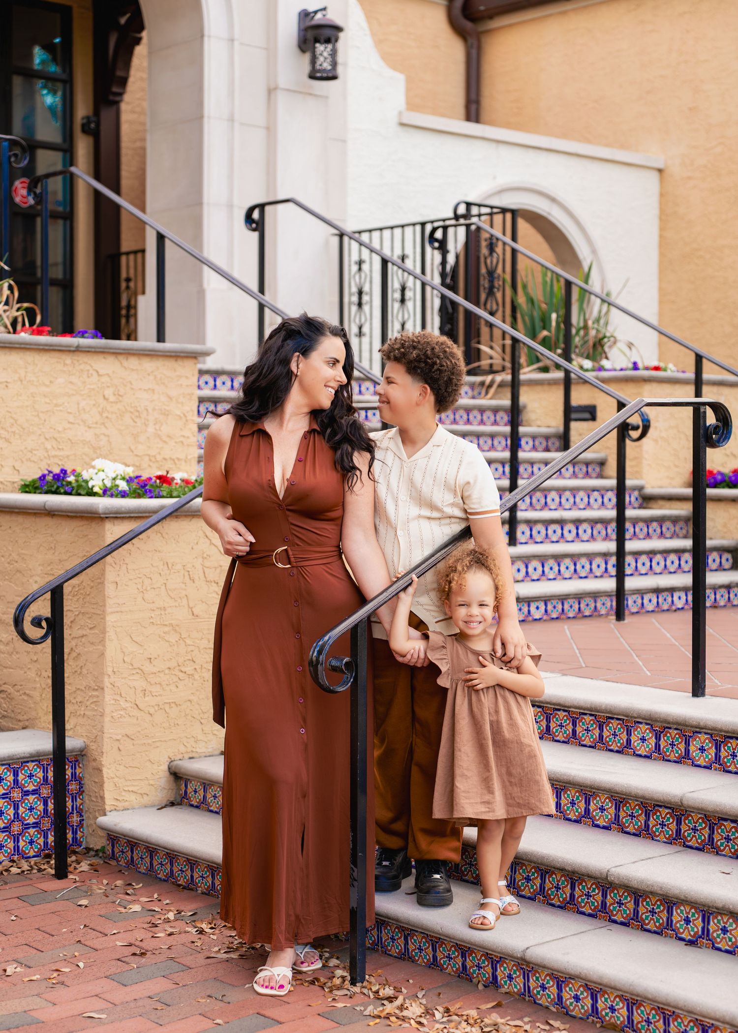 Family photography highlighting the stunning architecture and scenic campus of Rollins College in Winter Park, Florida.