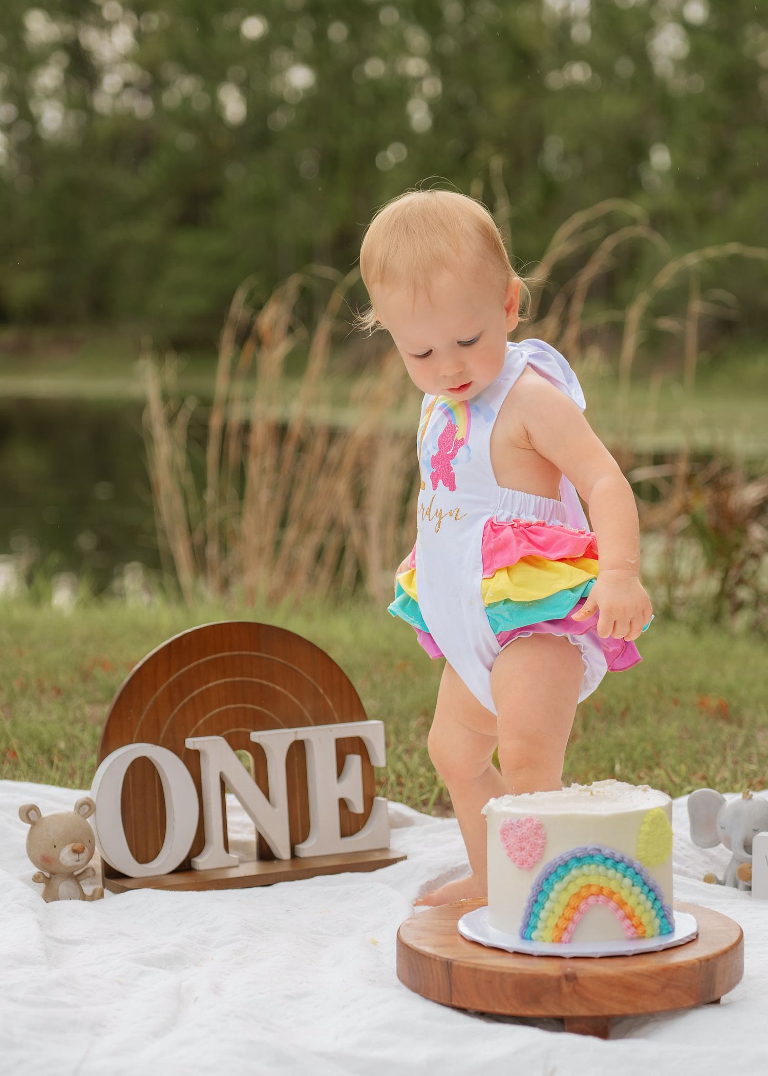 First birthday portraits celebrating girl's milestone in St. Cloud, Florida by family photographer