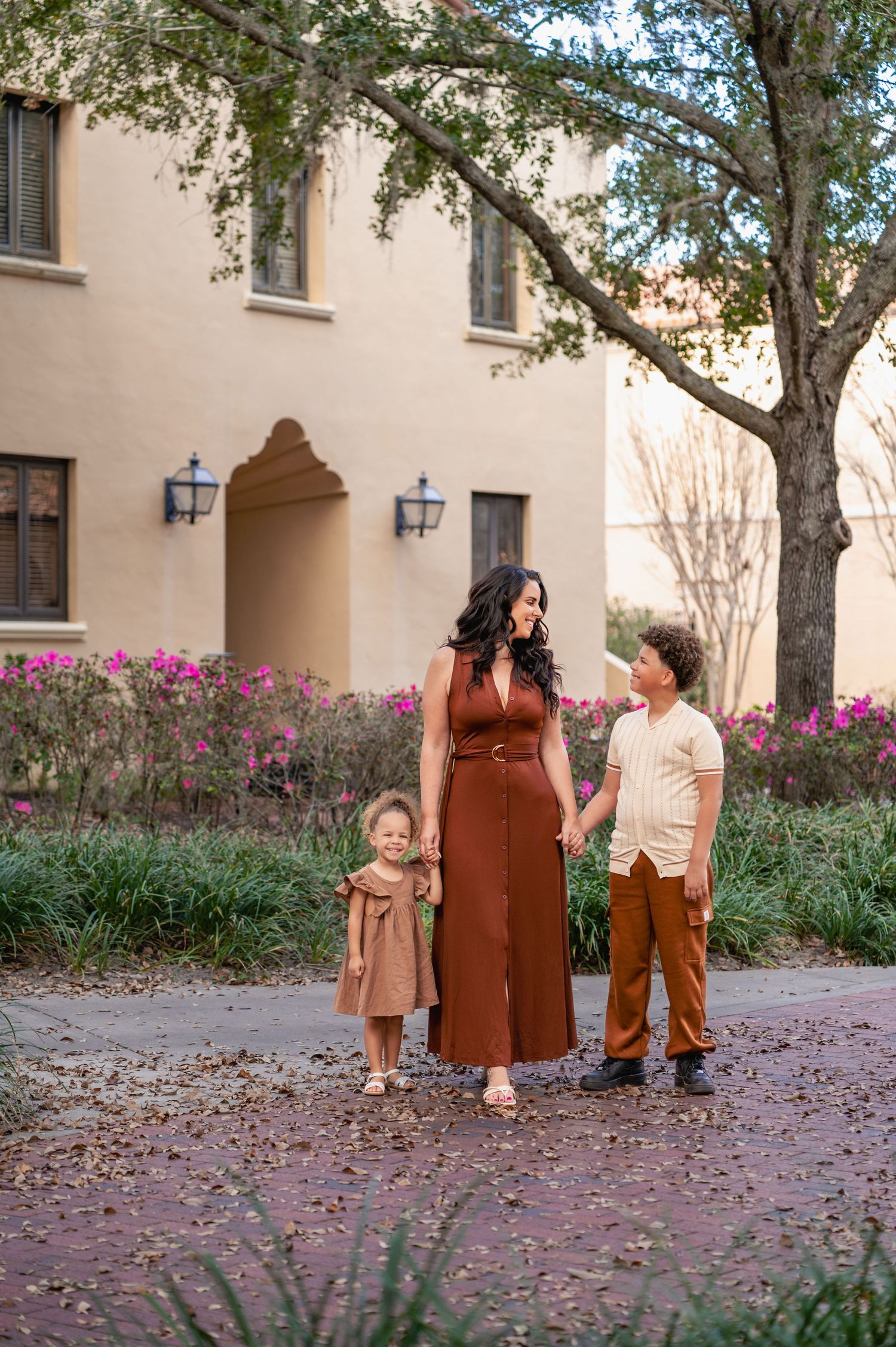 Timeless portraits of a mother and her children captured at Rollins College in Winter Park Florida.