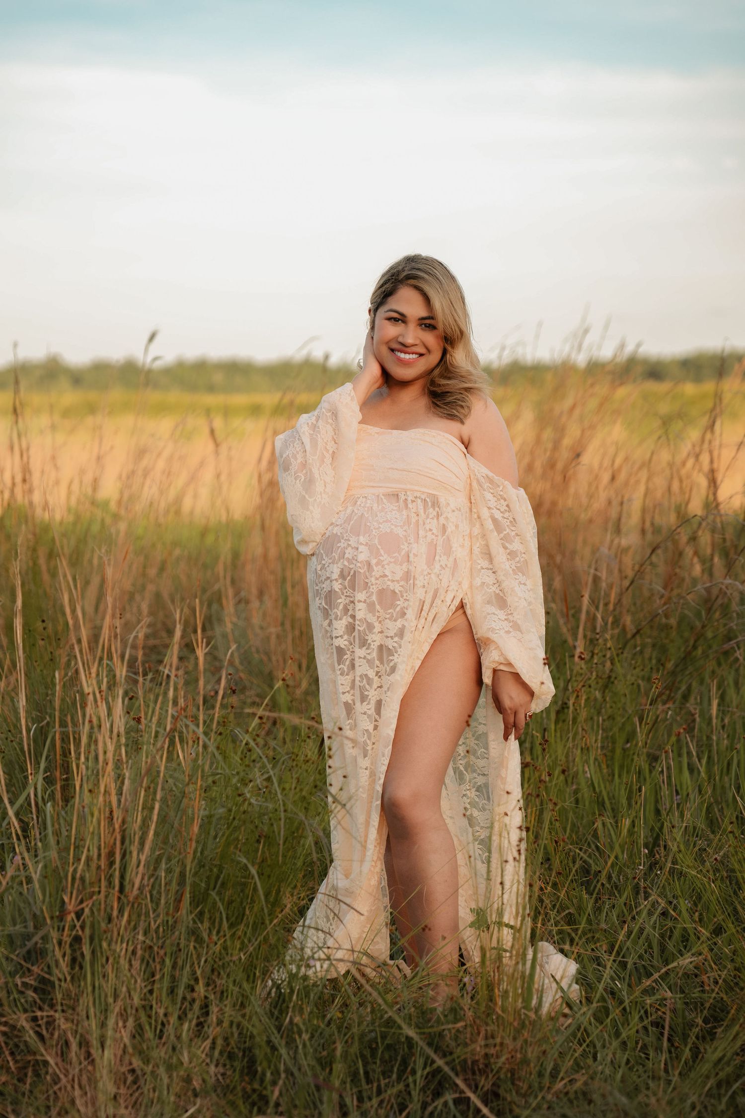Boho maternity portraits highlighting the natural beauty of Lake Runnymede Conservation Area and the excitement of welcoming a new baby.
