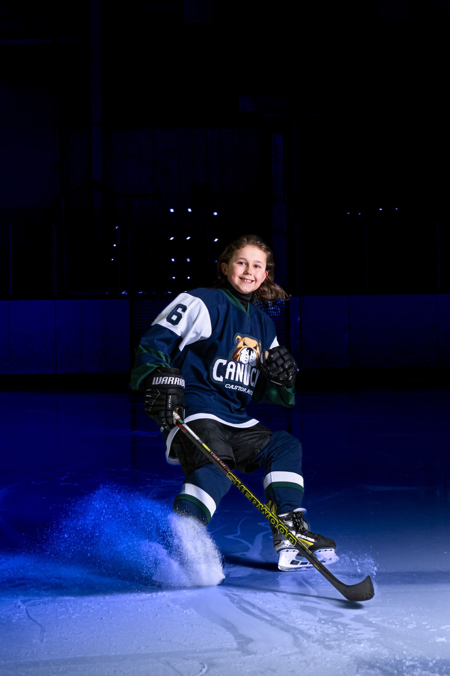 Cinematic on-ice hockey individual portrait with professional studio lighting U11 Castor Canucks Rep B in Ottawa