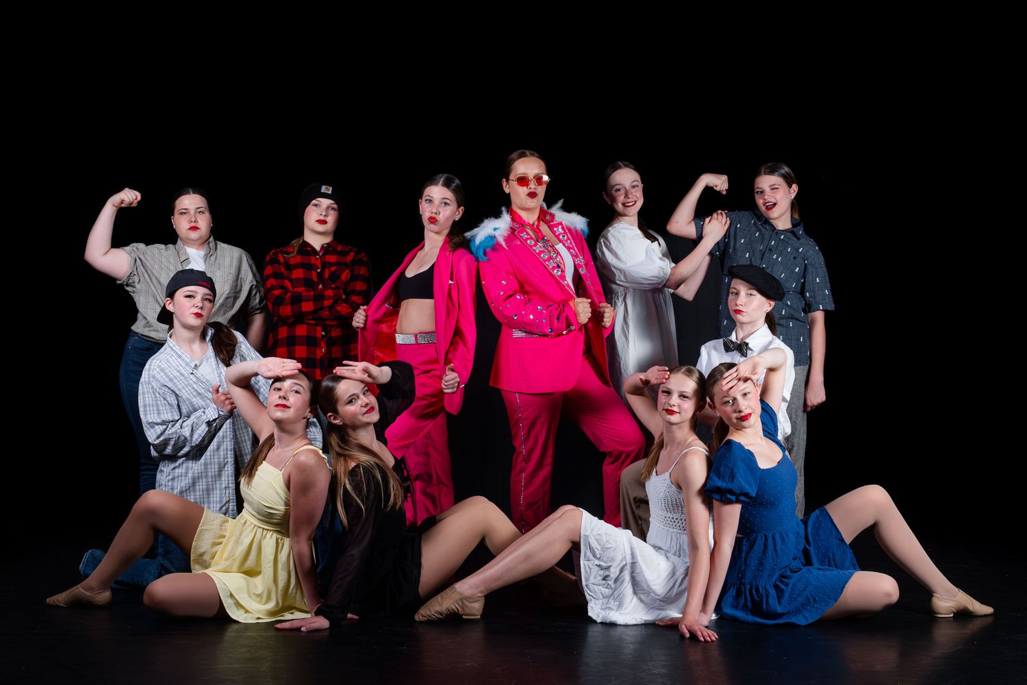 Technical dance school group portrait Timmins, Ontario emphasizing clean lines and professional studio lighting