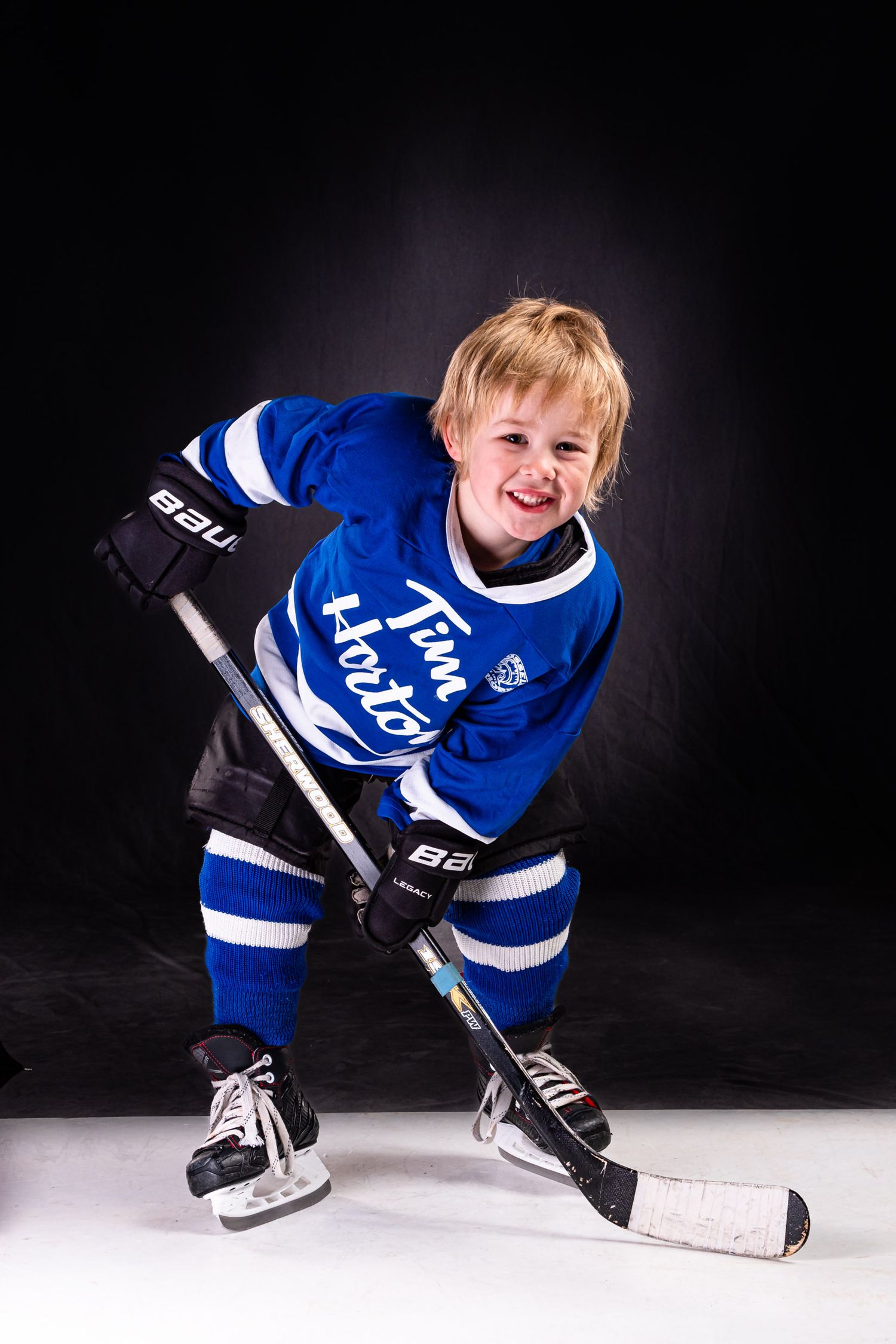 Happy Russell Warrior I.P. individual hockey player portrait with studio lighting shot in Russell, Ontario