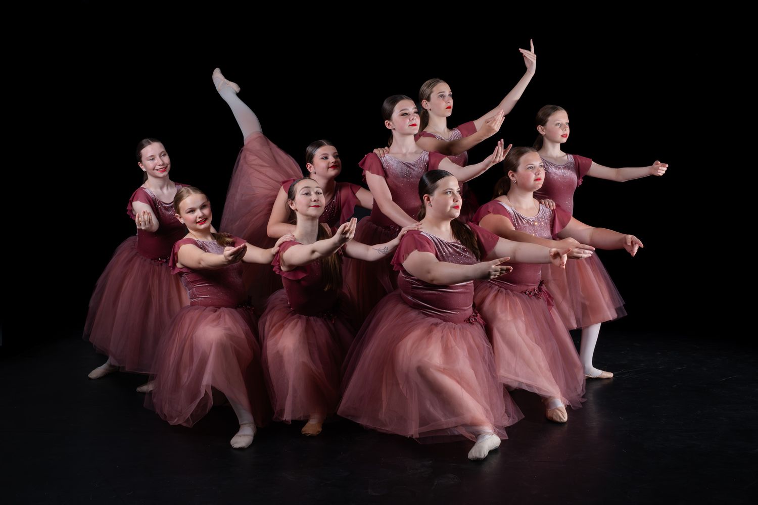 Technical ballet dance school group portrait Timmins, Ontario emphasizing clean lines and professional studio lighting