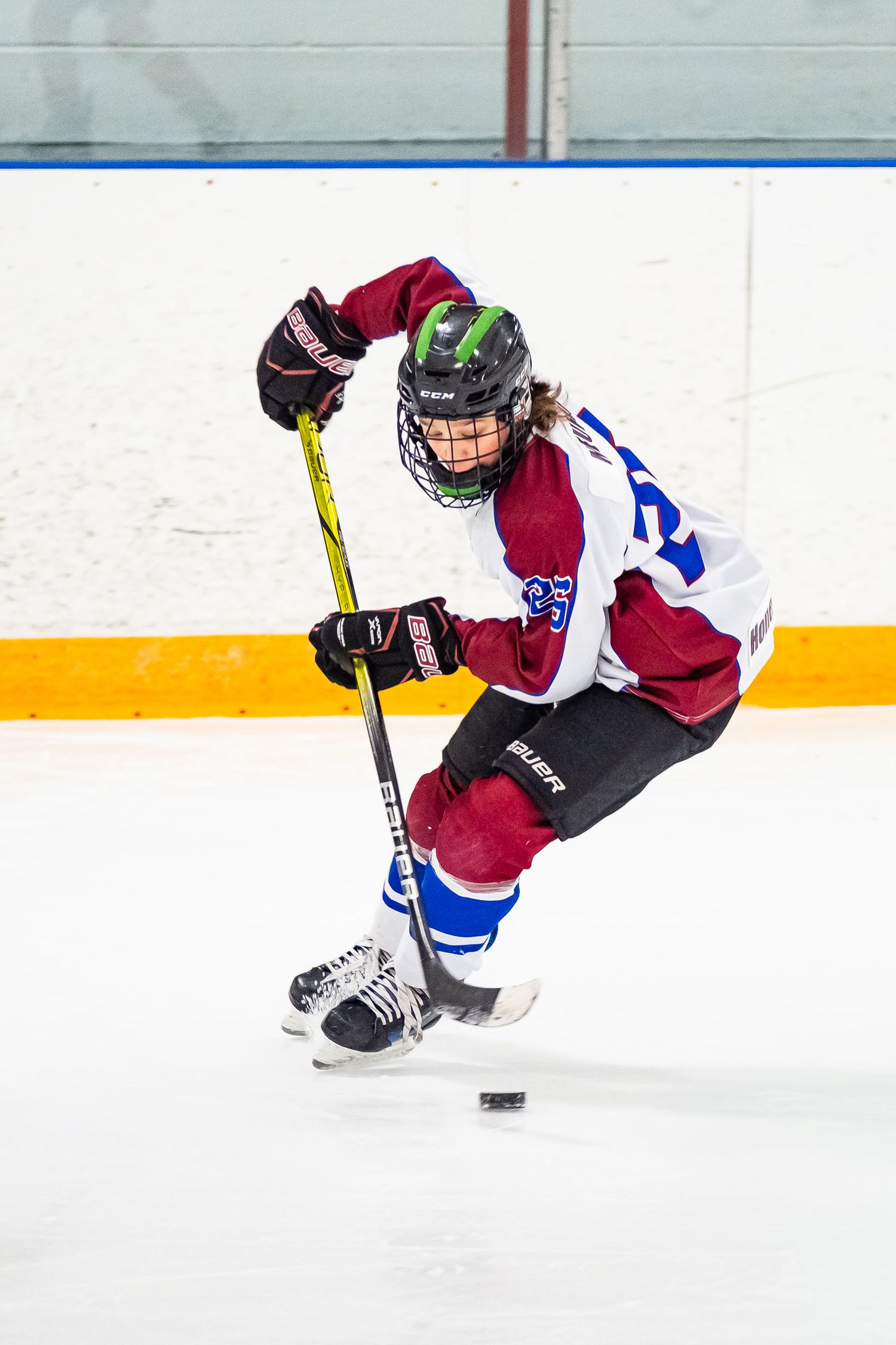 High-intensity hockey action shot during a live game with Russell Warriors by The Show Sports Media, Preserve the dedication series
