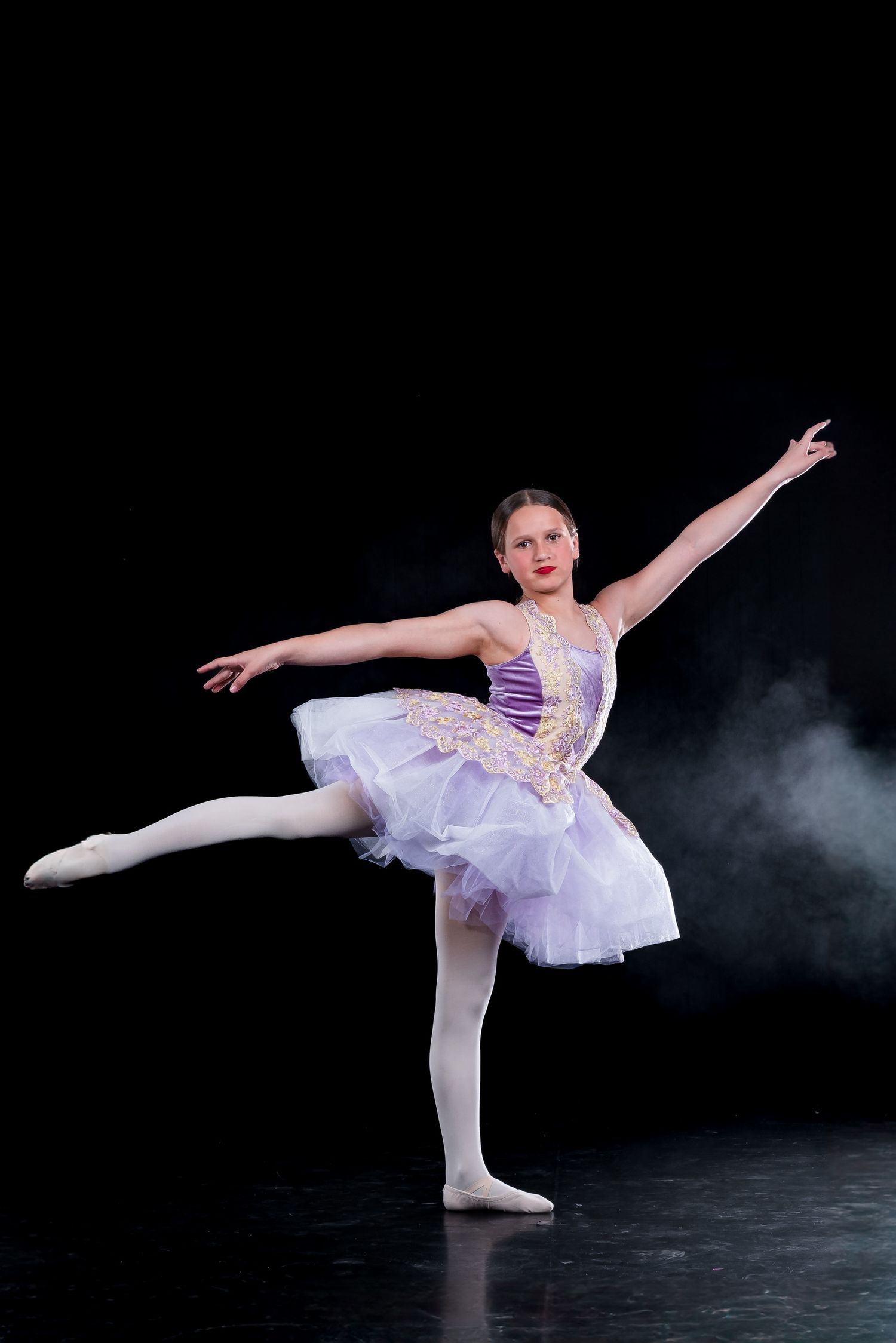Ballet dancer individual portrait in Orleans emphasizing disciplined form and turnout during a coordinated media day